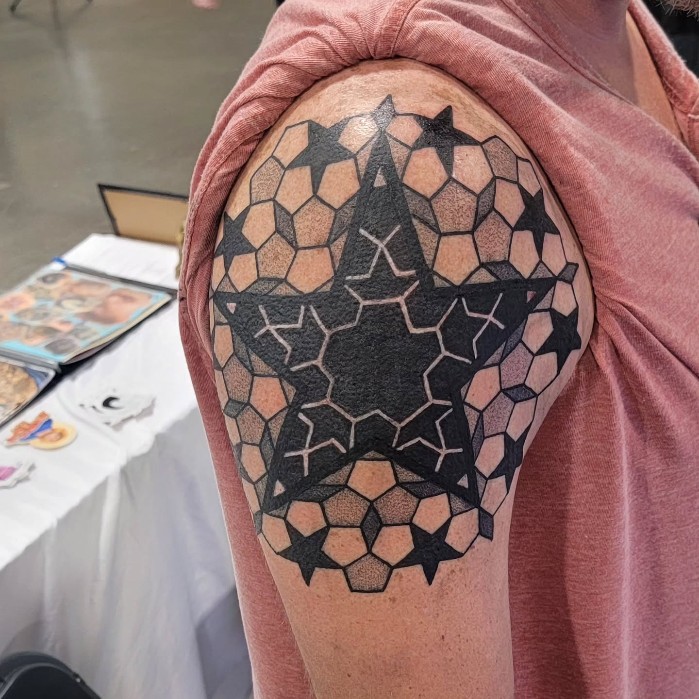 Geometric star pattern geometric tattoo on the shoulder by Hatchetfoot Art