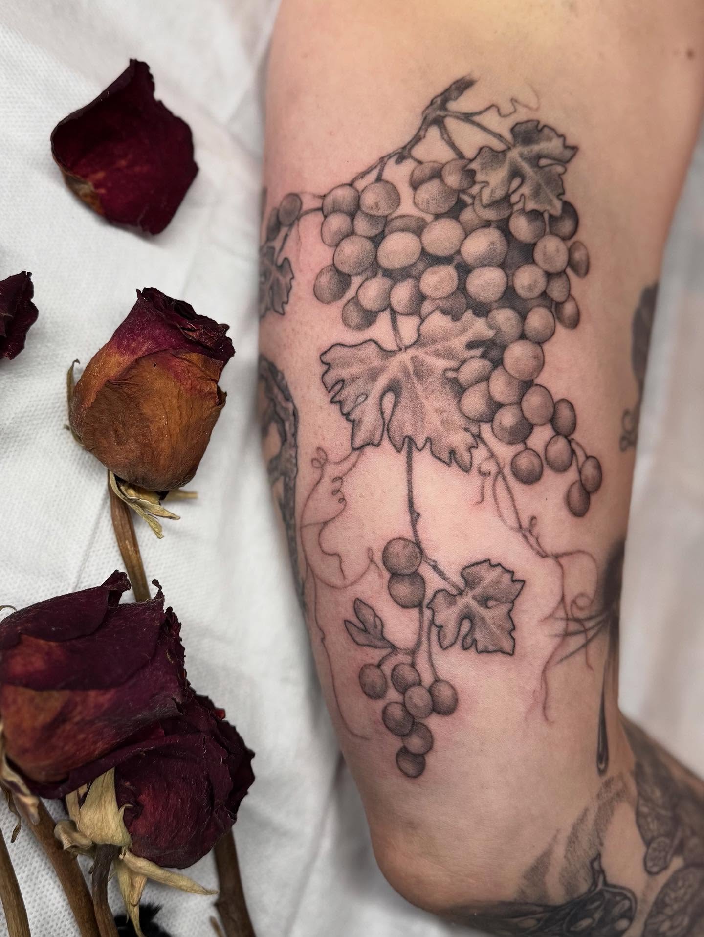 Grapevine black and grey tattoo on the forearm by Jamie Draven 🐺