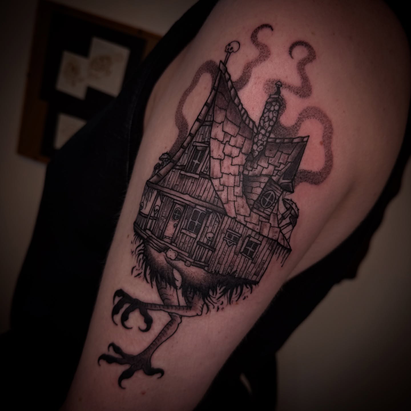 Haunted house black and grey tattoo on the forearm by Eden H., Columbus, Ohio