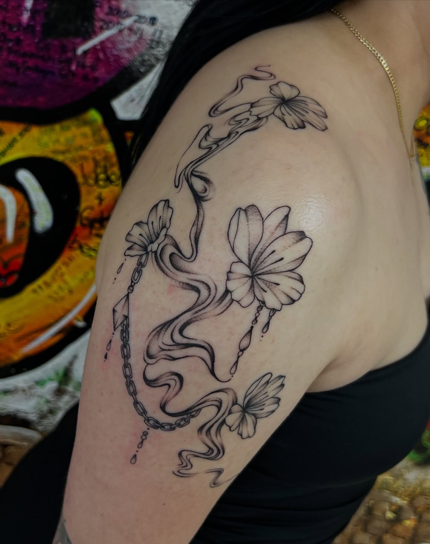 Flowers and smoke black and grey tattoo on the shoulder by Nadia ★