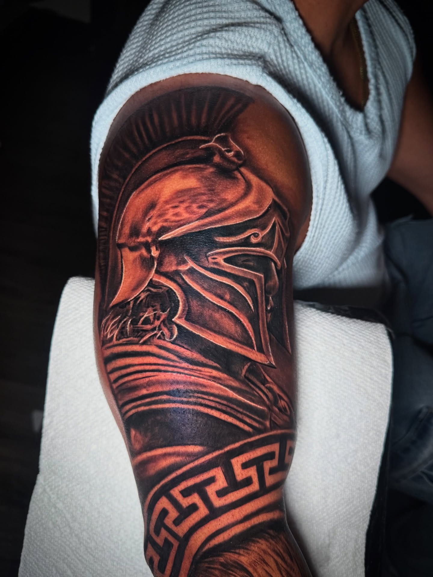 Helmeted warrior realism tattoo on the forearm by Nj Tattoo Artist Inkdyou, Bloomfield, New Jersey