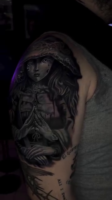 Woman with hood dark realism tattoo by Steven Pelkey, Eastpointe, Michigan