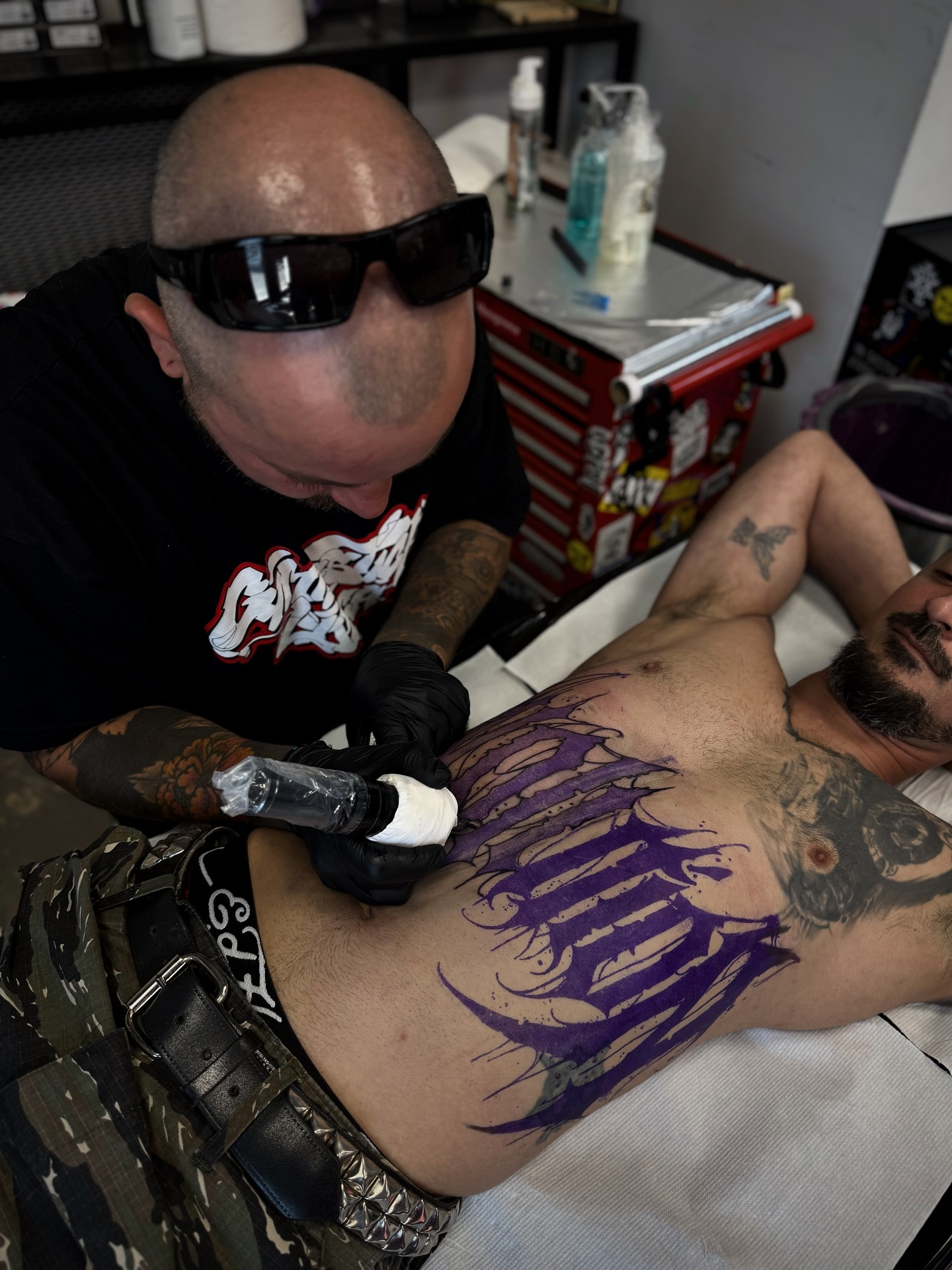 Purple tribal design tribal tattoo on the chest by Comastein__________✍🏼️