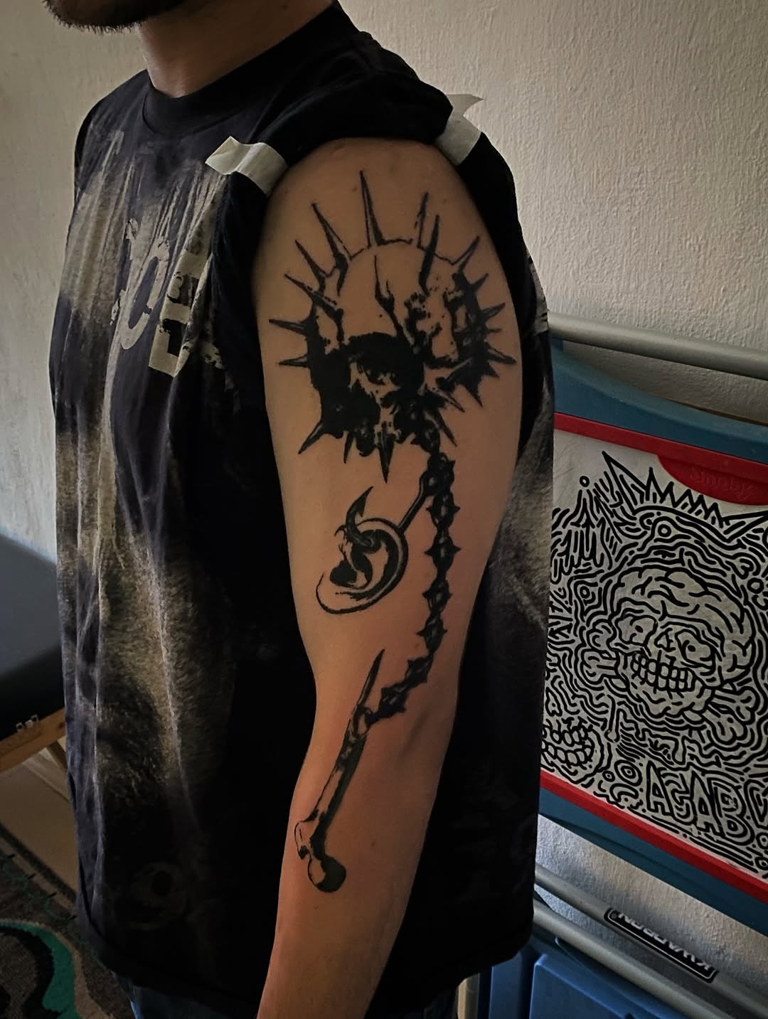 Skull with spikes and bone cyber sigilism tattoo on the forearm by John, Kyiv, Ukraine