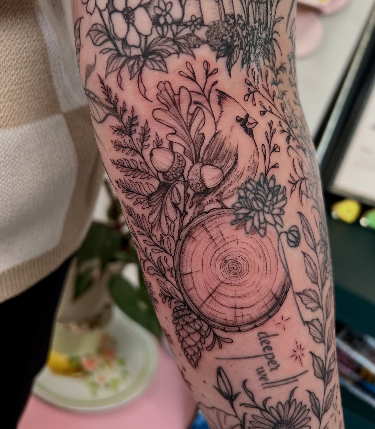 Forest scene fine line tattoo on the forearm by Amanda Morris