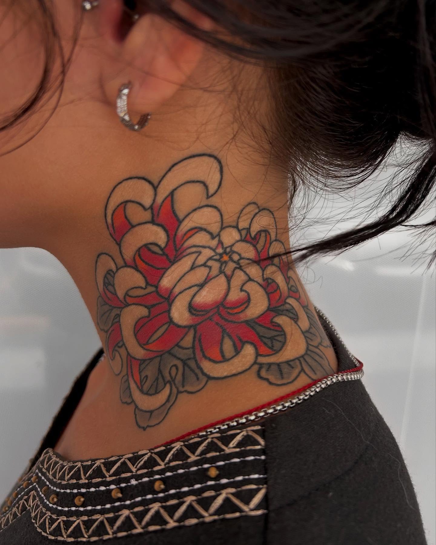 Chrysanthemum American traditional tattoo on the neck by Mr Nikita, New York, New York