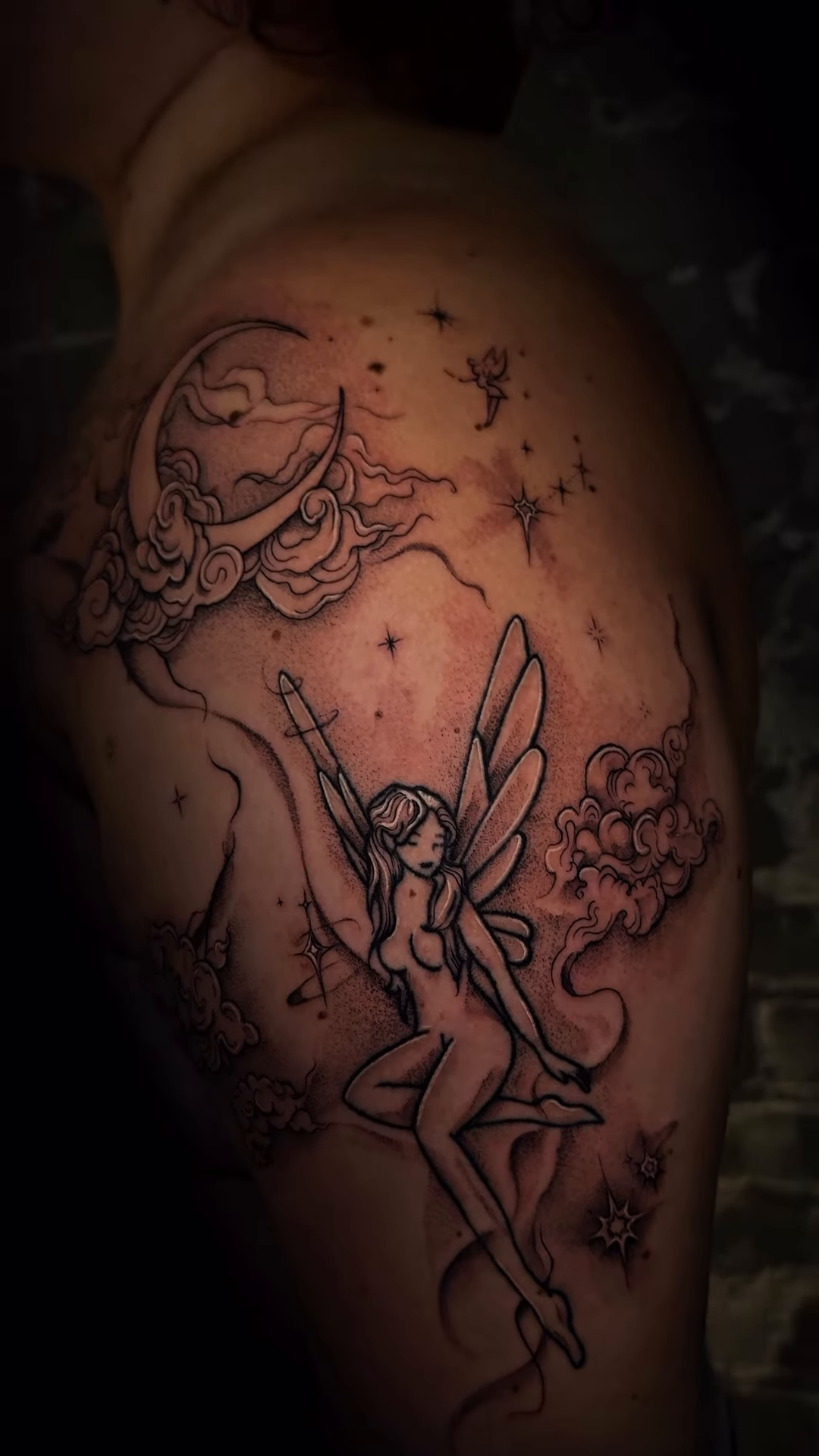 Fairy with moon and clouds realism tattoo on the shoulder by Nyc Tattoo Manhattan
