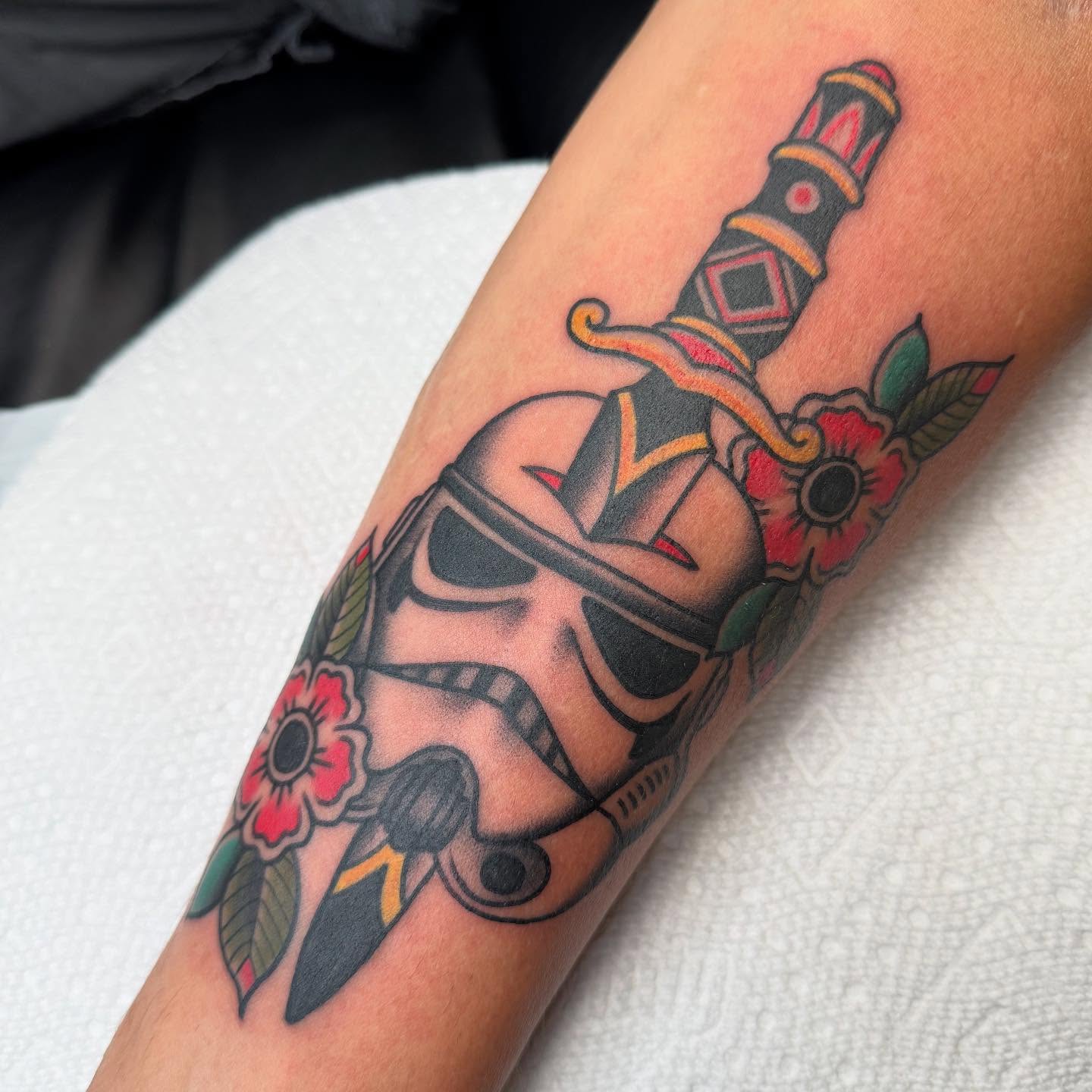 Sword and skull American traditional tattoo on the forearm by Chase Martines