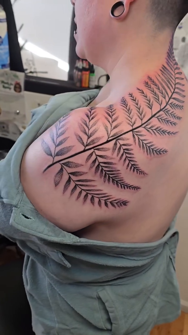 Fern frond fine line tattoo by Camuel Whaley