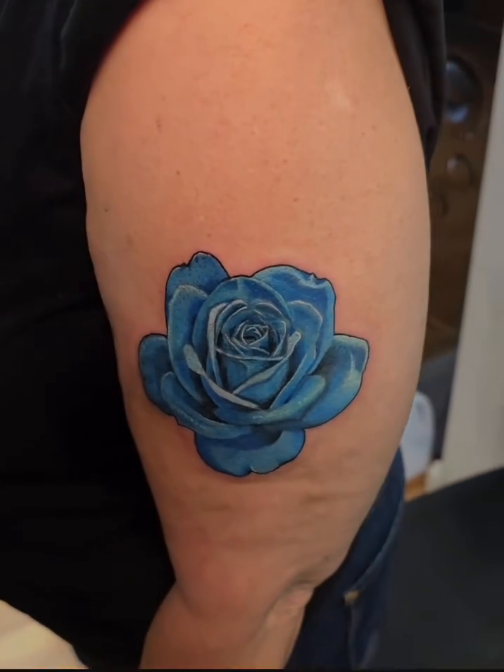 Blue rose realism tattoo by Camuel Whaley