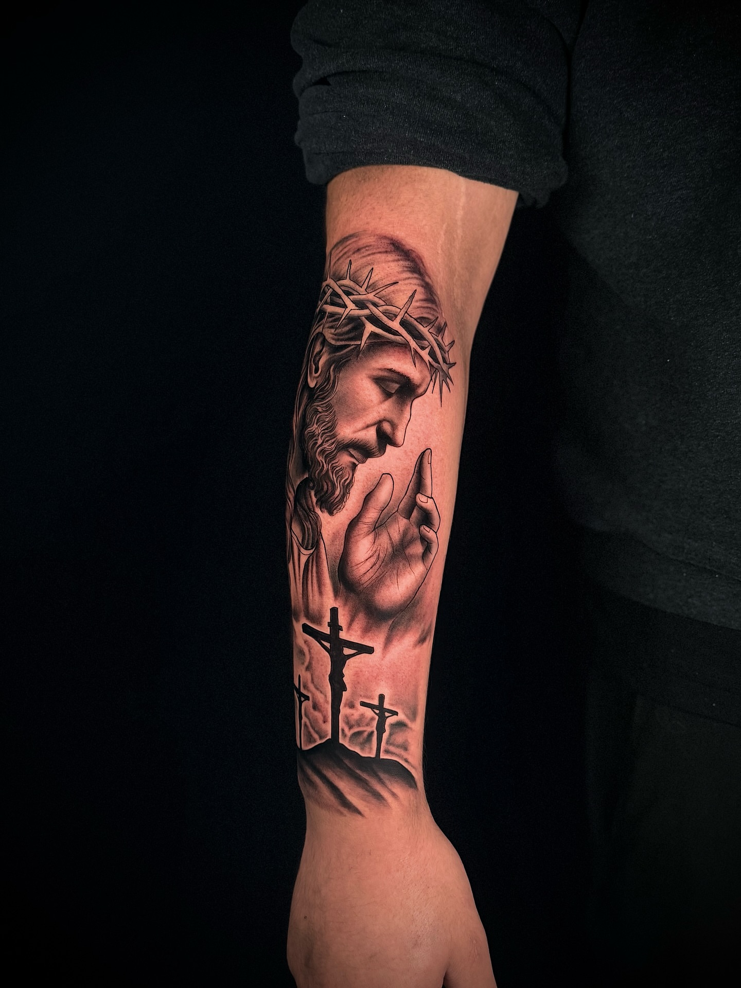 Religious figure realism tattoo on the forearm by Alex macoco, Houston, Texas