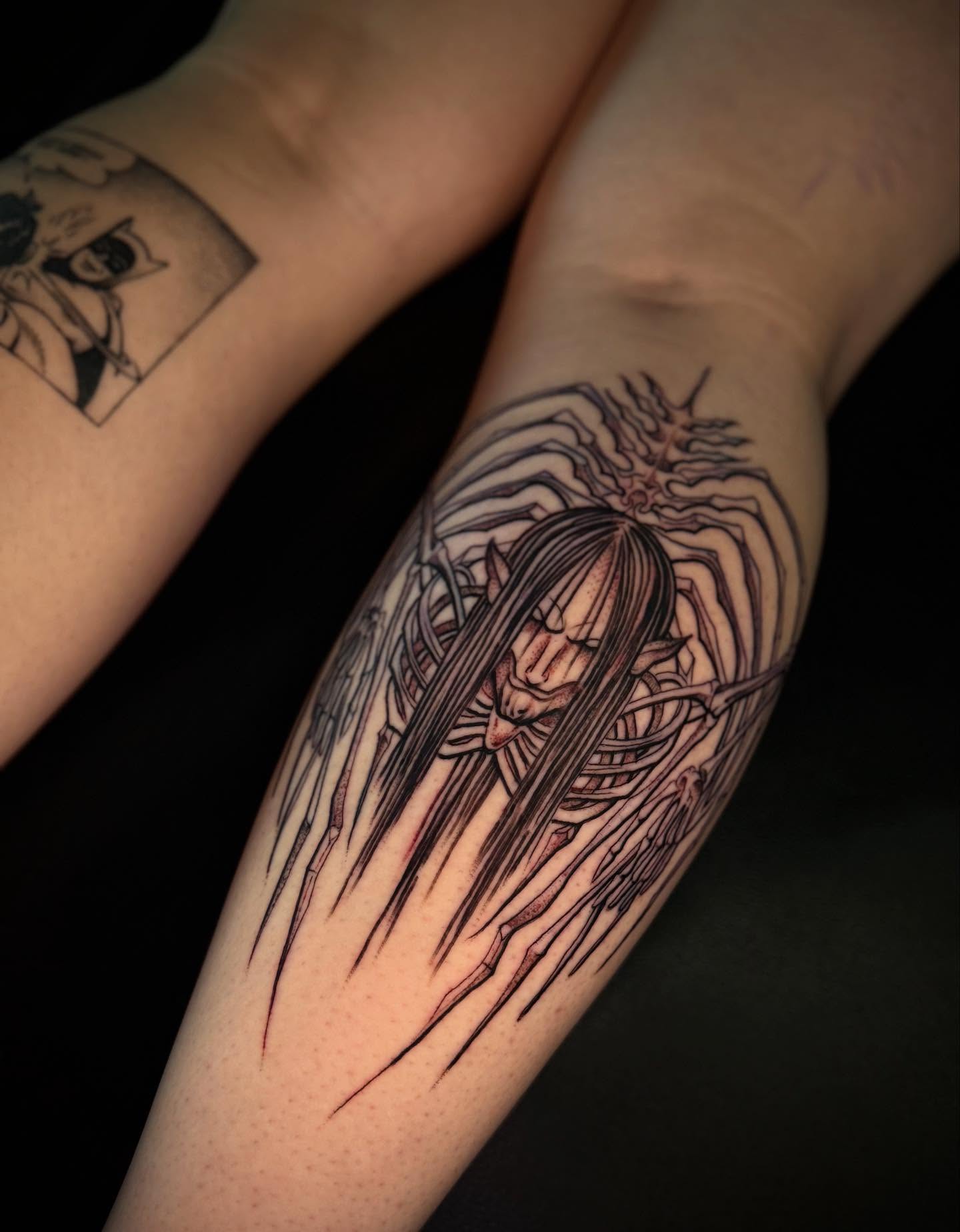 Woman with long hair dark realism tattoo on the forearm by Thomas Martinez