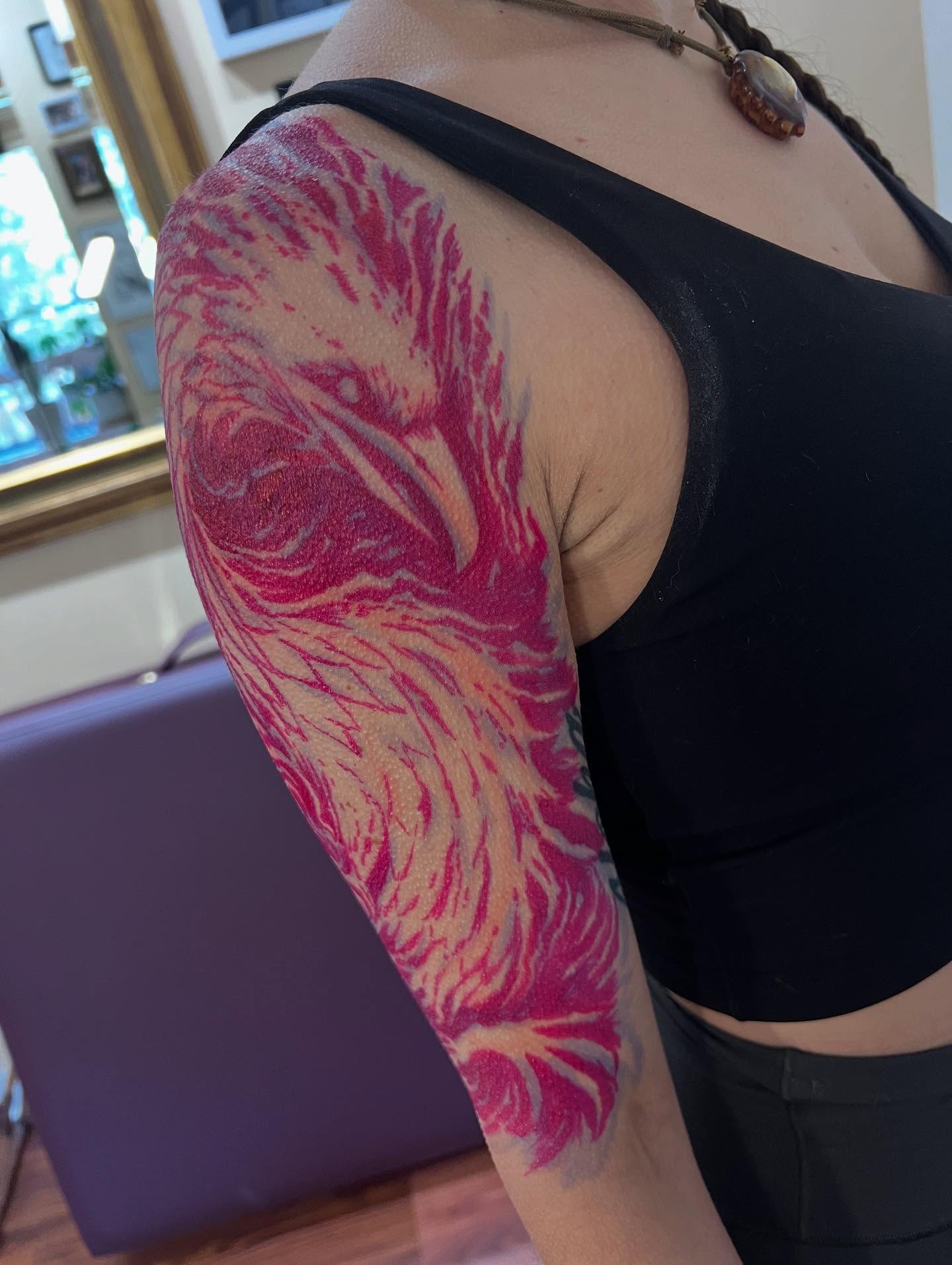 Flaming phoenix neo-traditional tattoo on the upper arm by Anna Wolff, Richmond, Virginia