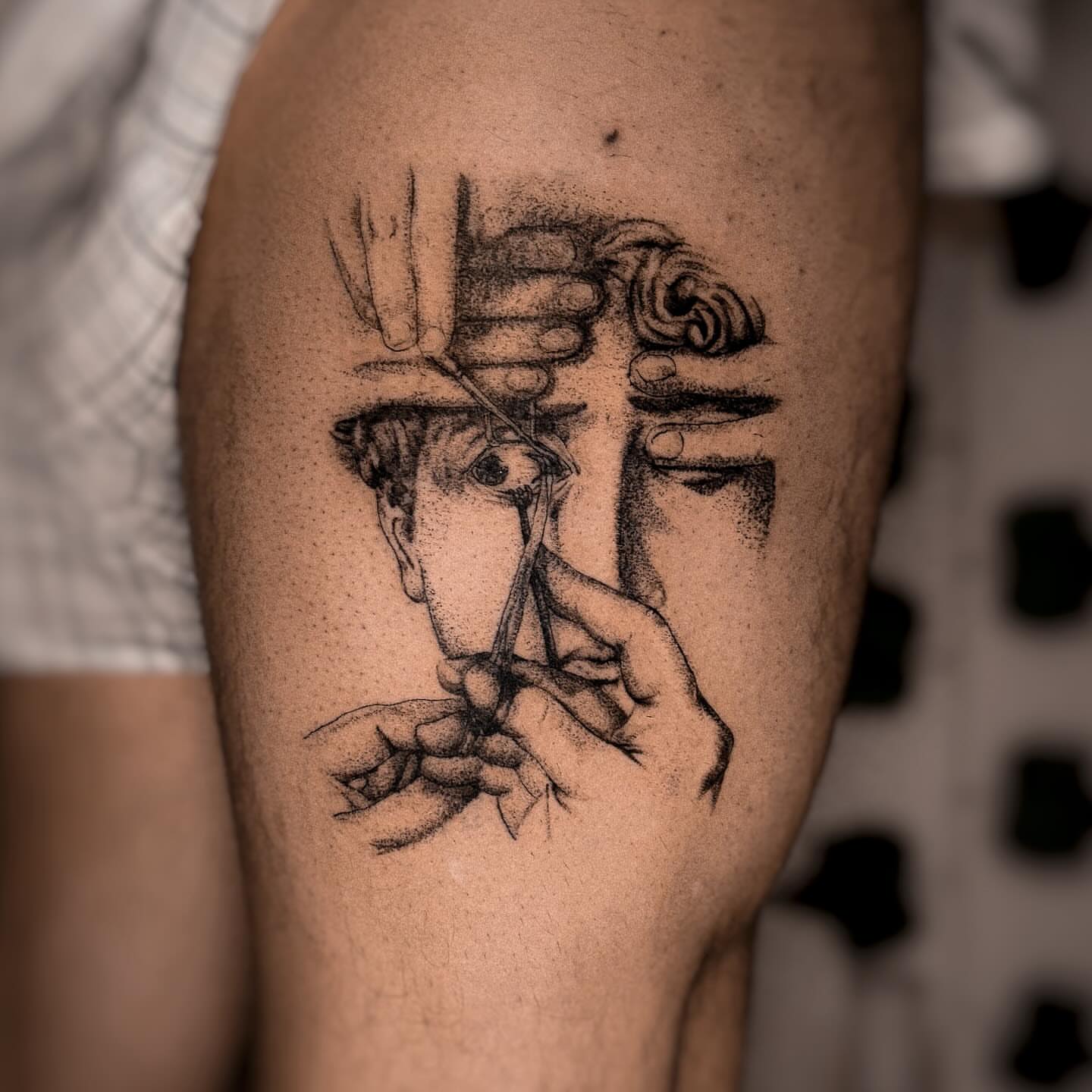 Man's face dotwork tattoo on the forearm by 조조