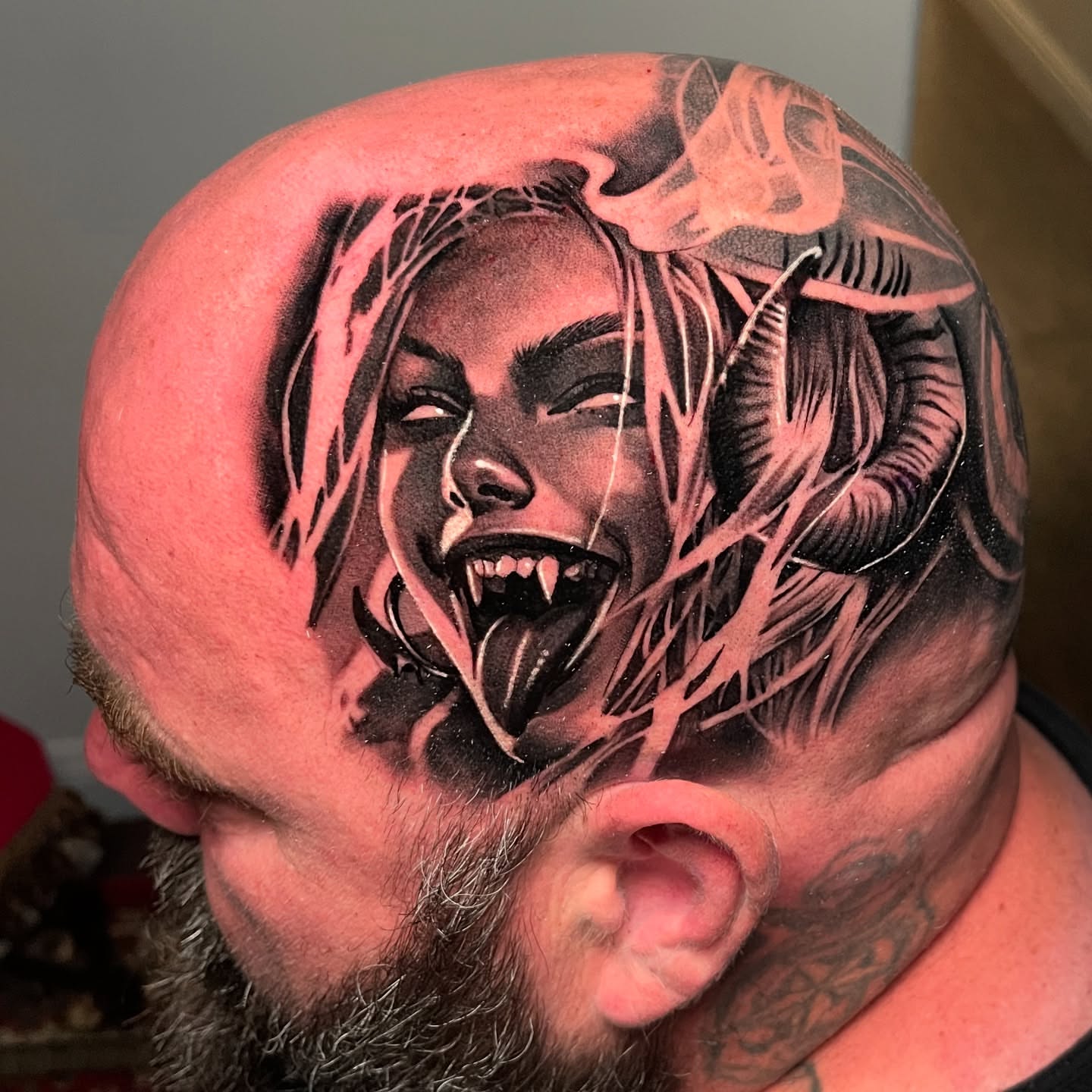 Woman with horns dark realism tattoo on the head by Michael Martinez