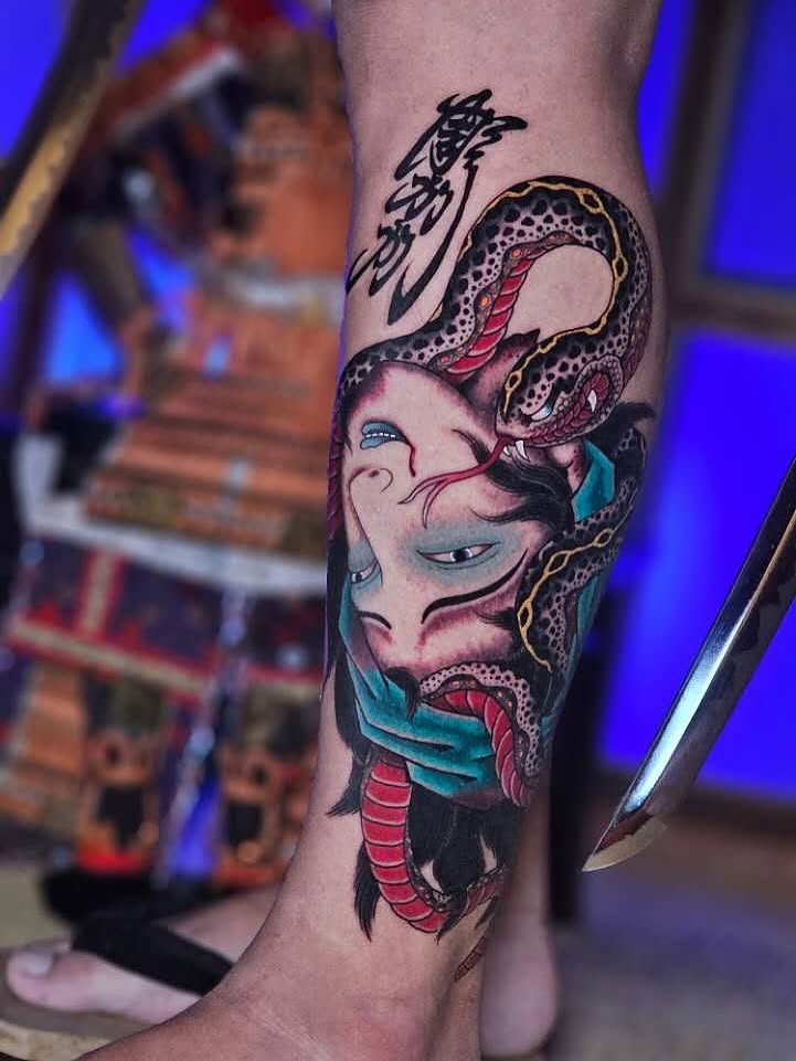 Snake and woman japanese irezumi tattoo on the forearm by 彫かか