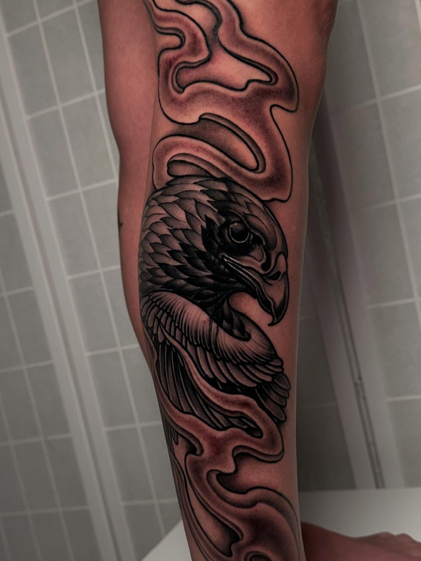 Eagle black and grey tattoo on the forearm by Henry Gaßner