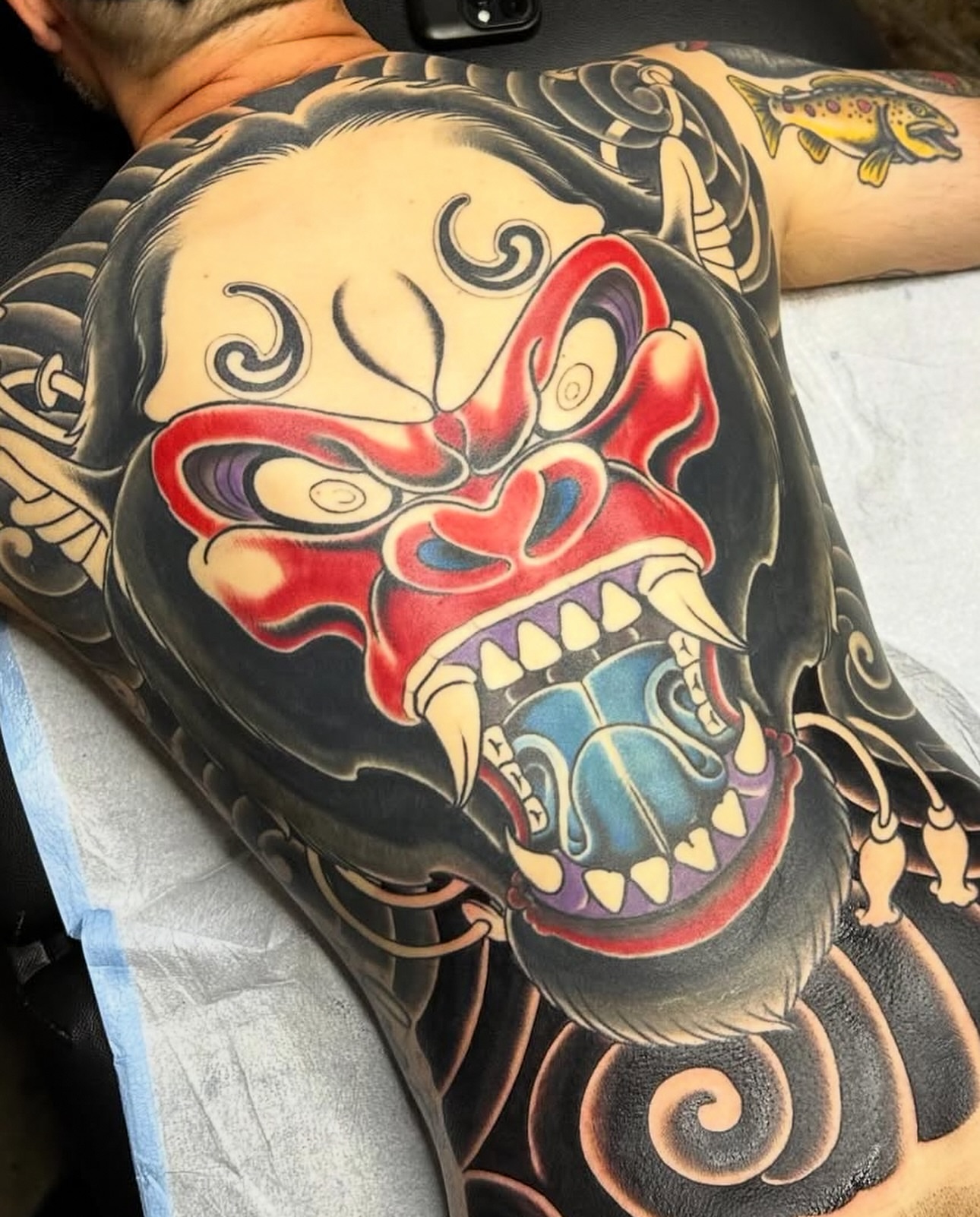 Demon mask japanese irezumi tattoo on the back by Tony Medellin 7X9X