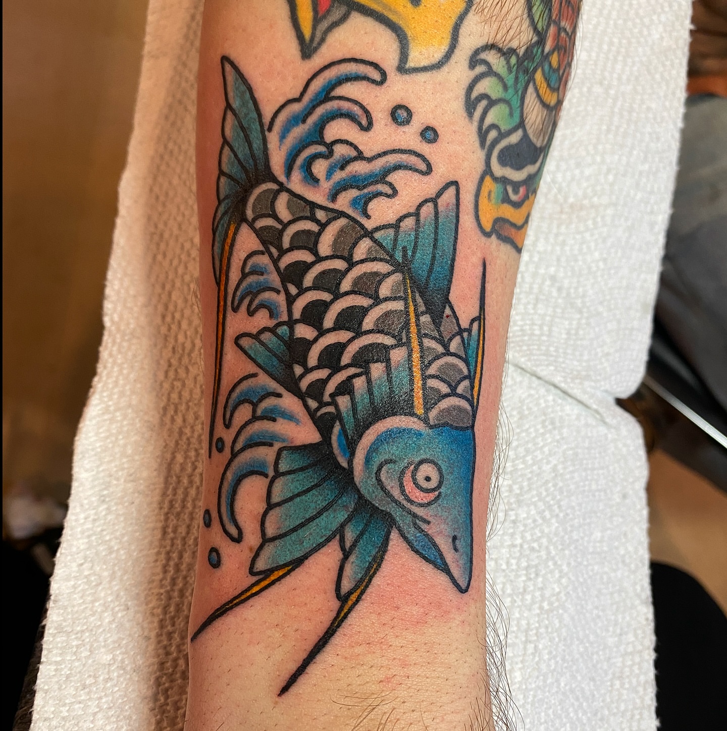Fish American traditional tattoo on the forearm by atomlenhart, Lancaster, Pennsylvania
