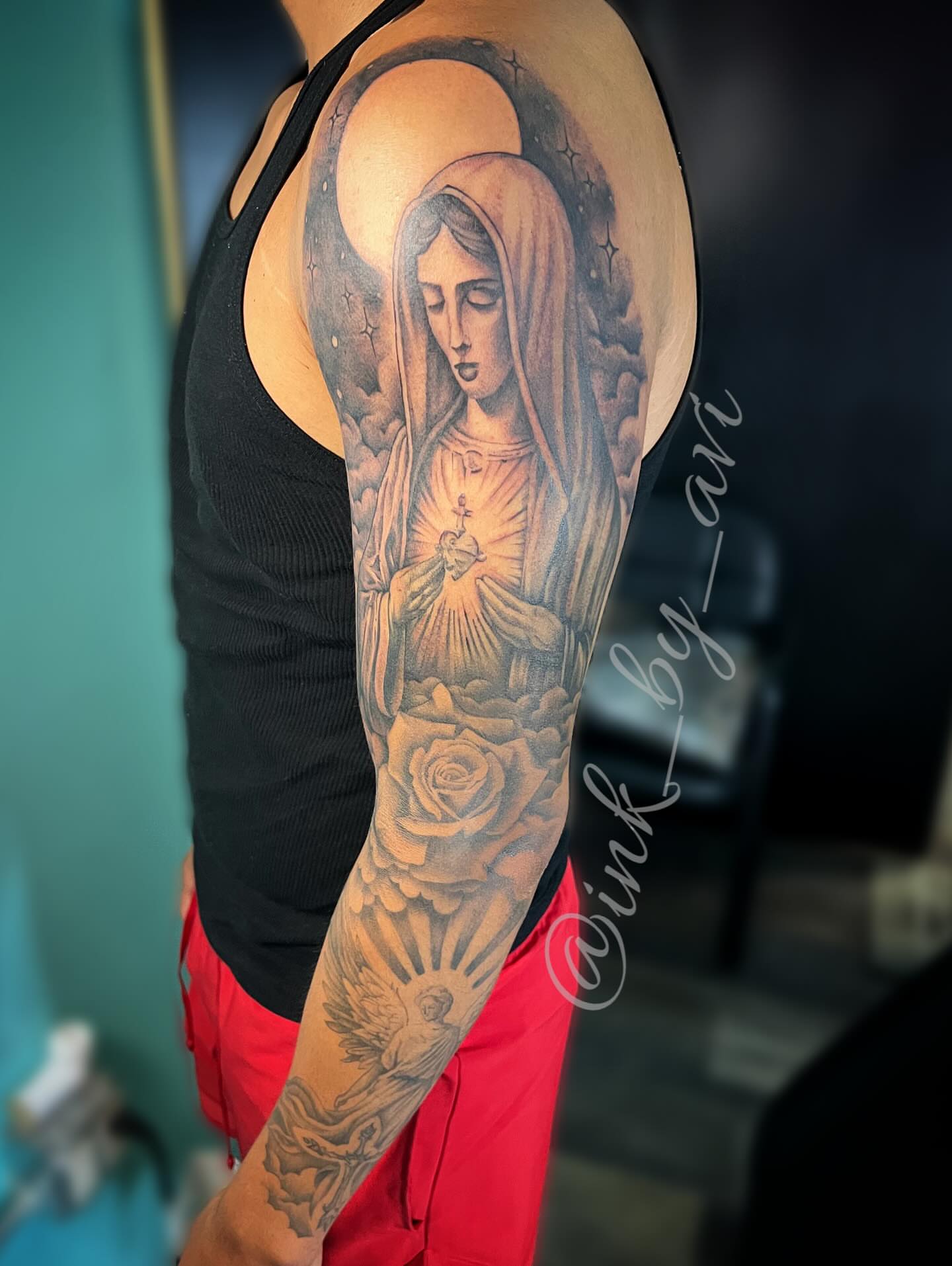 Religious figure realism tattoo on the forearm by Avi, Cleveland, Ohio