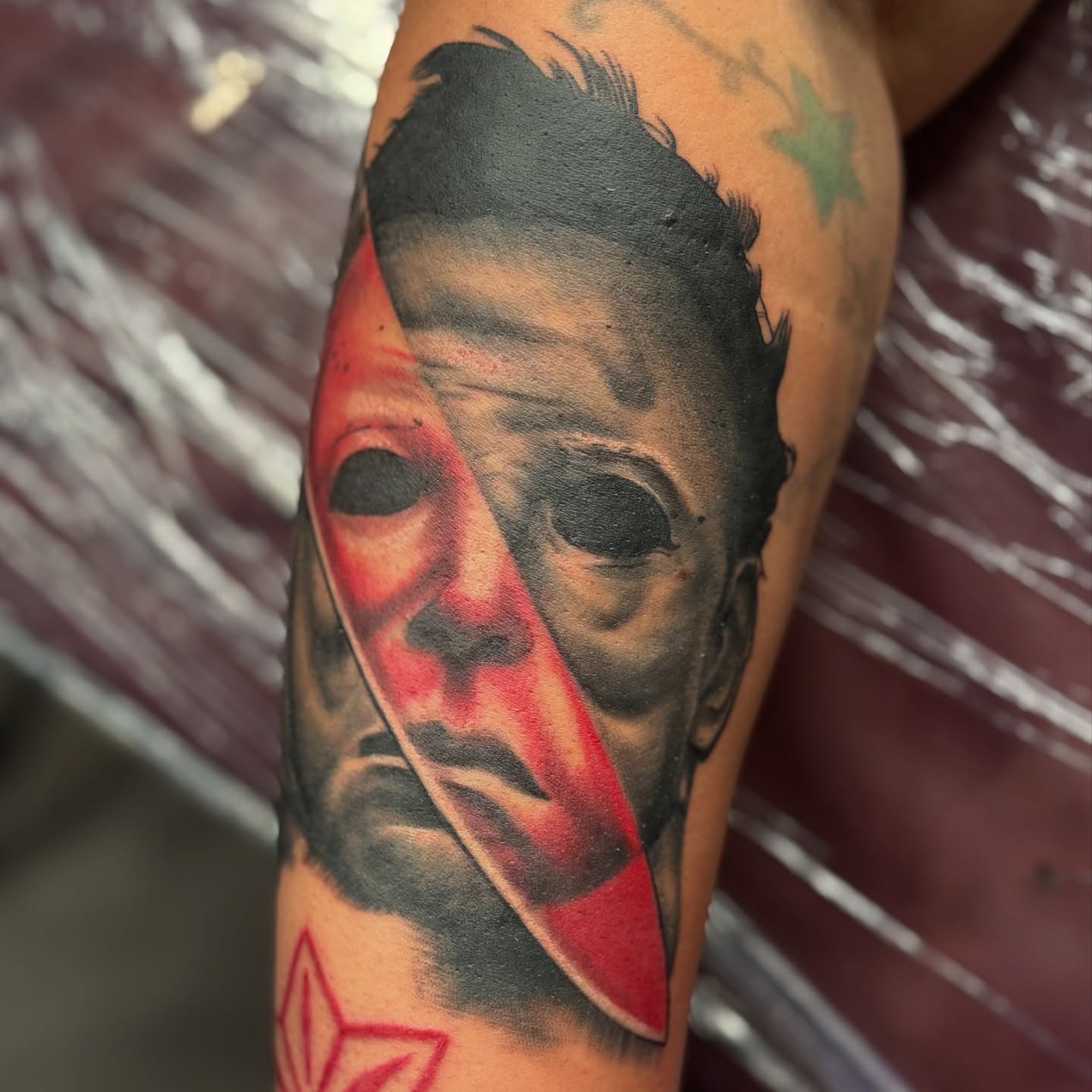 Michael Myers mask realism tattoo on the forearm by Austin Poliszuk, Minneapolis, Minnesota