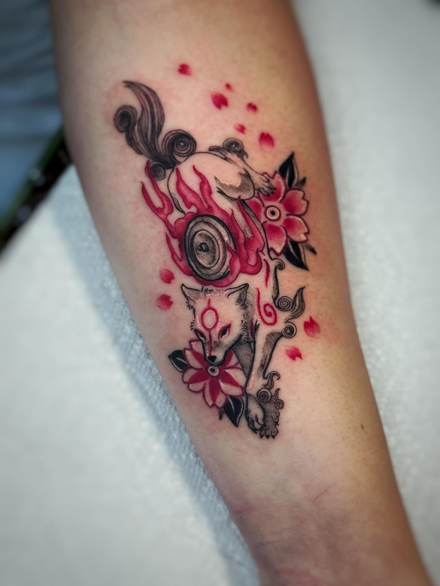 Fox and flowers japanese irezumi tattoo on the forearm by Anna Saveria