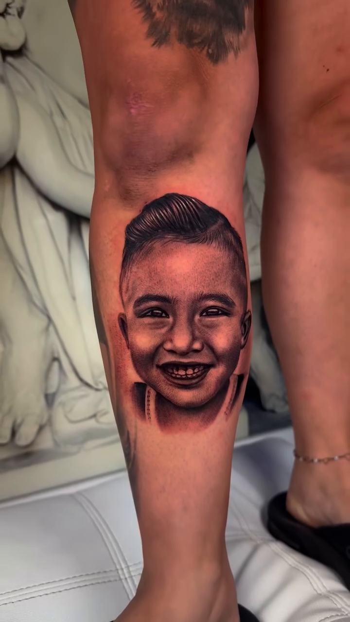 Child's portrait realism tattoo by Fernando Andrade Jr