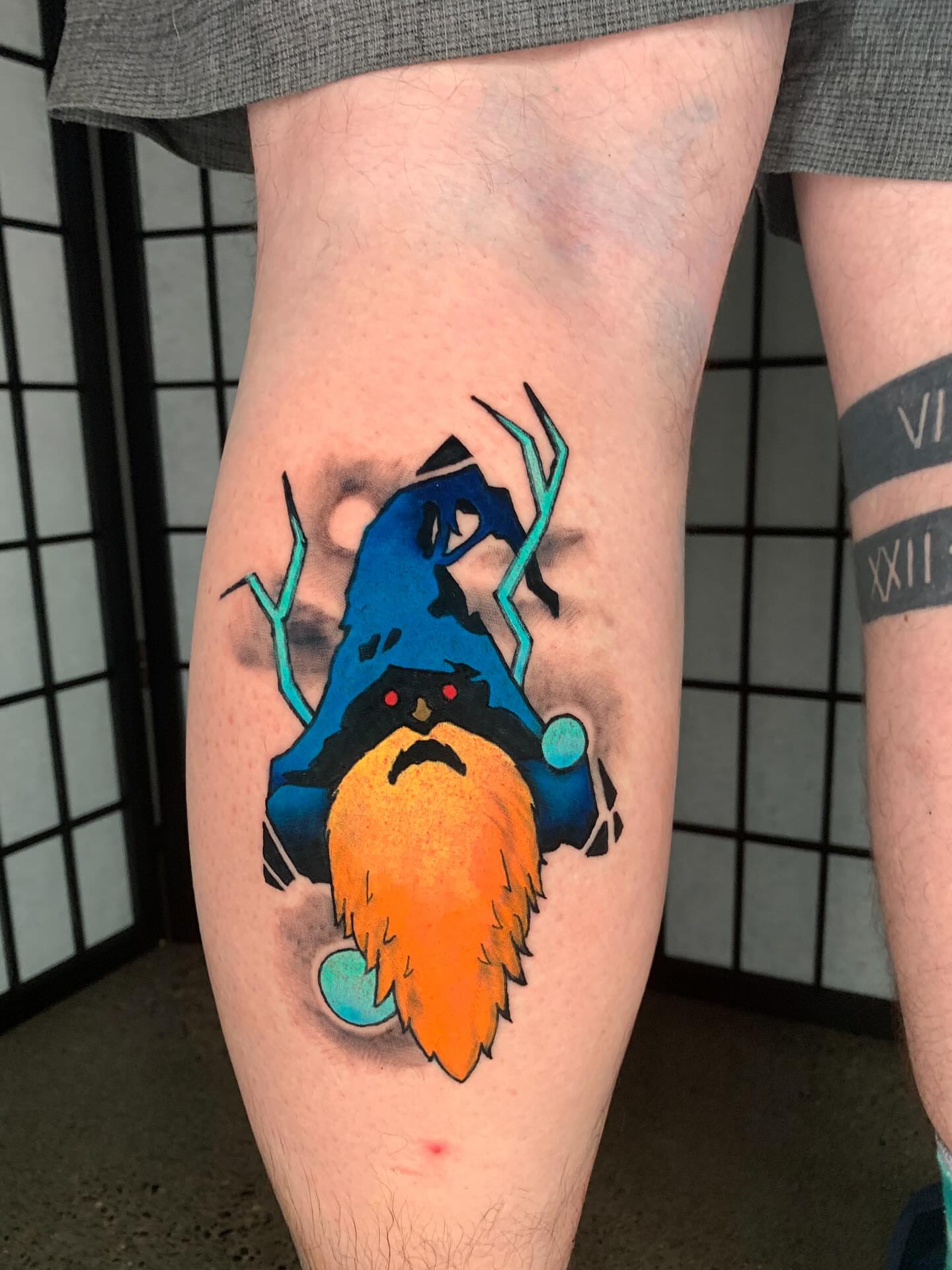 Gnome new school tattoo on the thigh by Devon