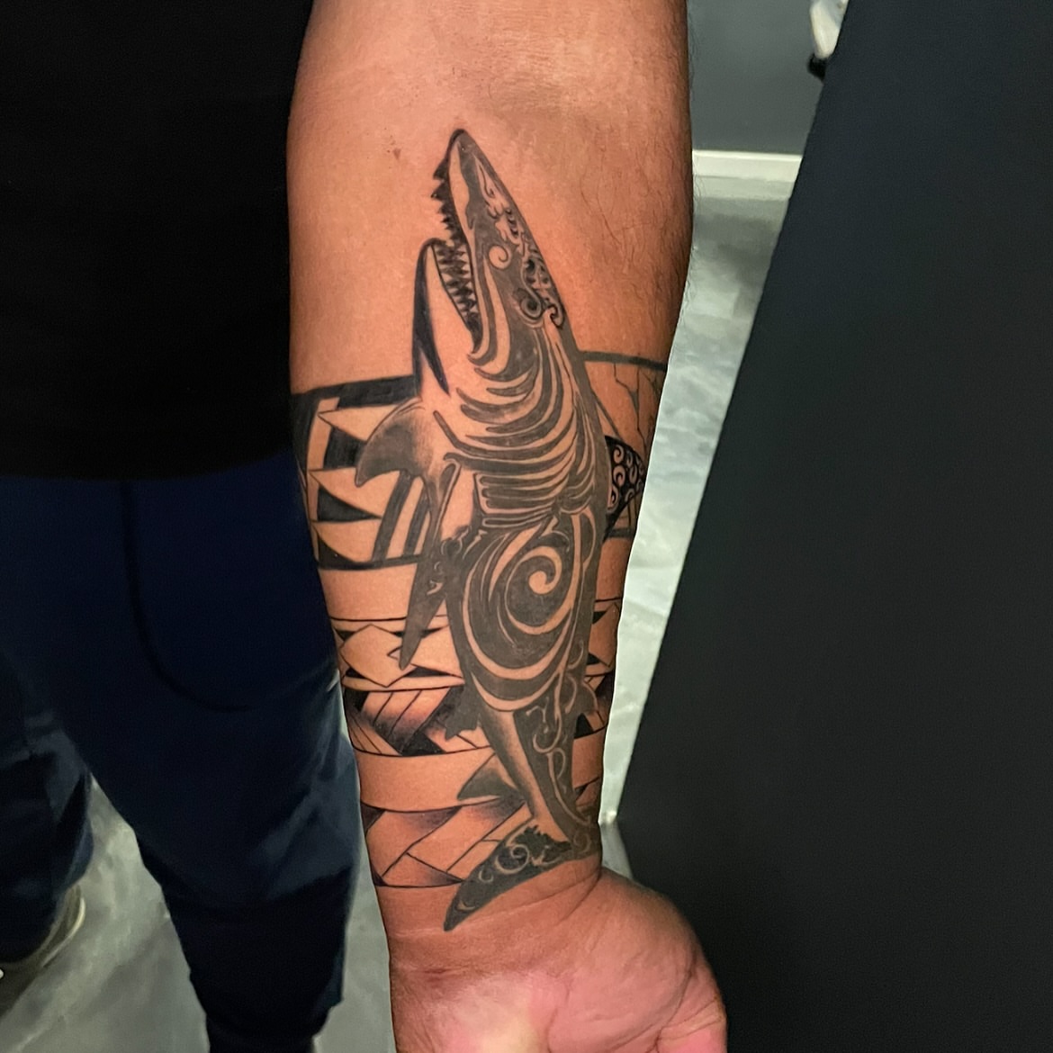 Shark geometric tattoo on the forearm by Chubbs