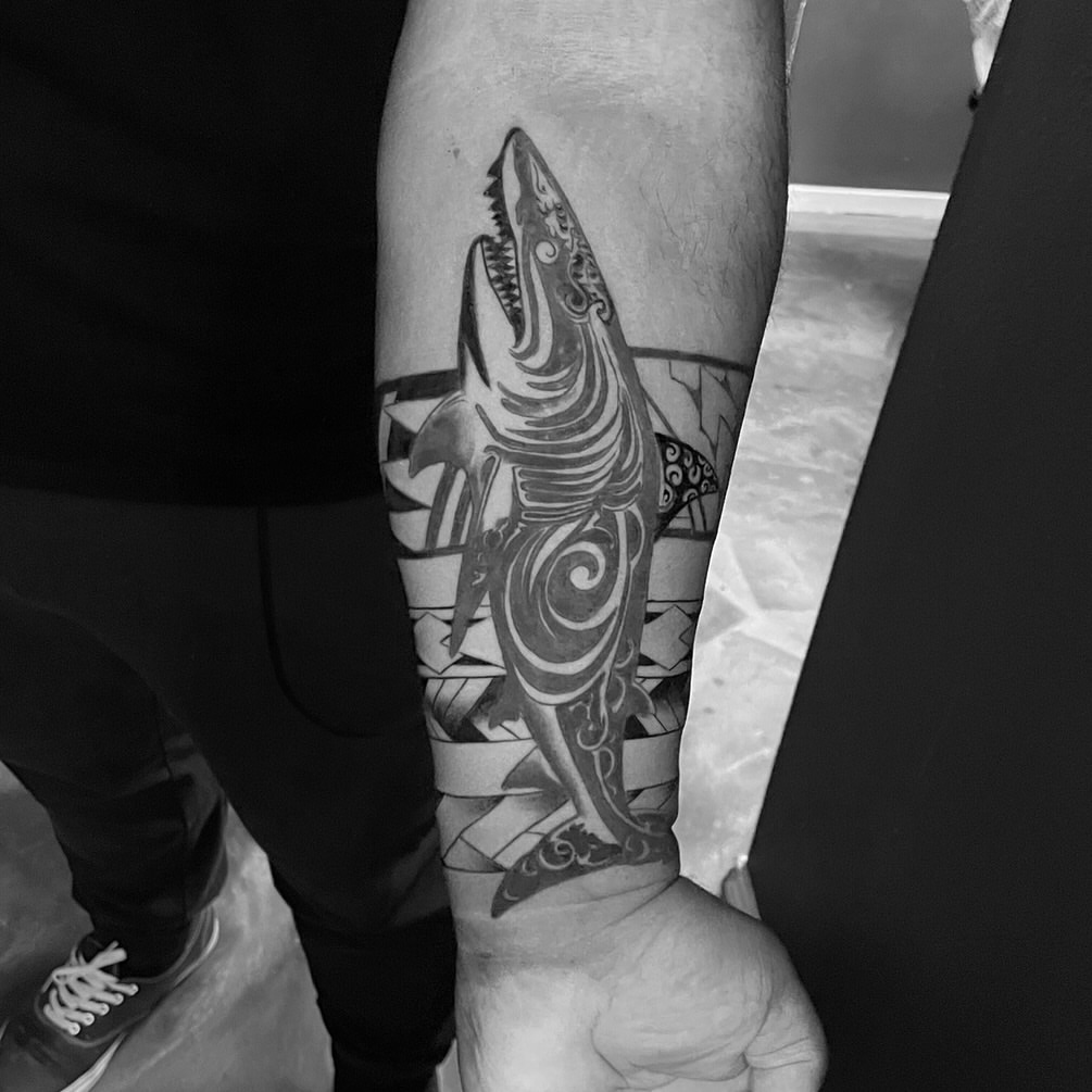 Shark tribal tattoo on the forearm by Chubbs