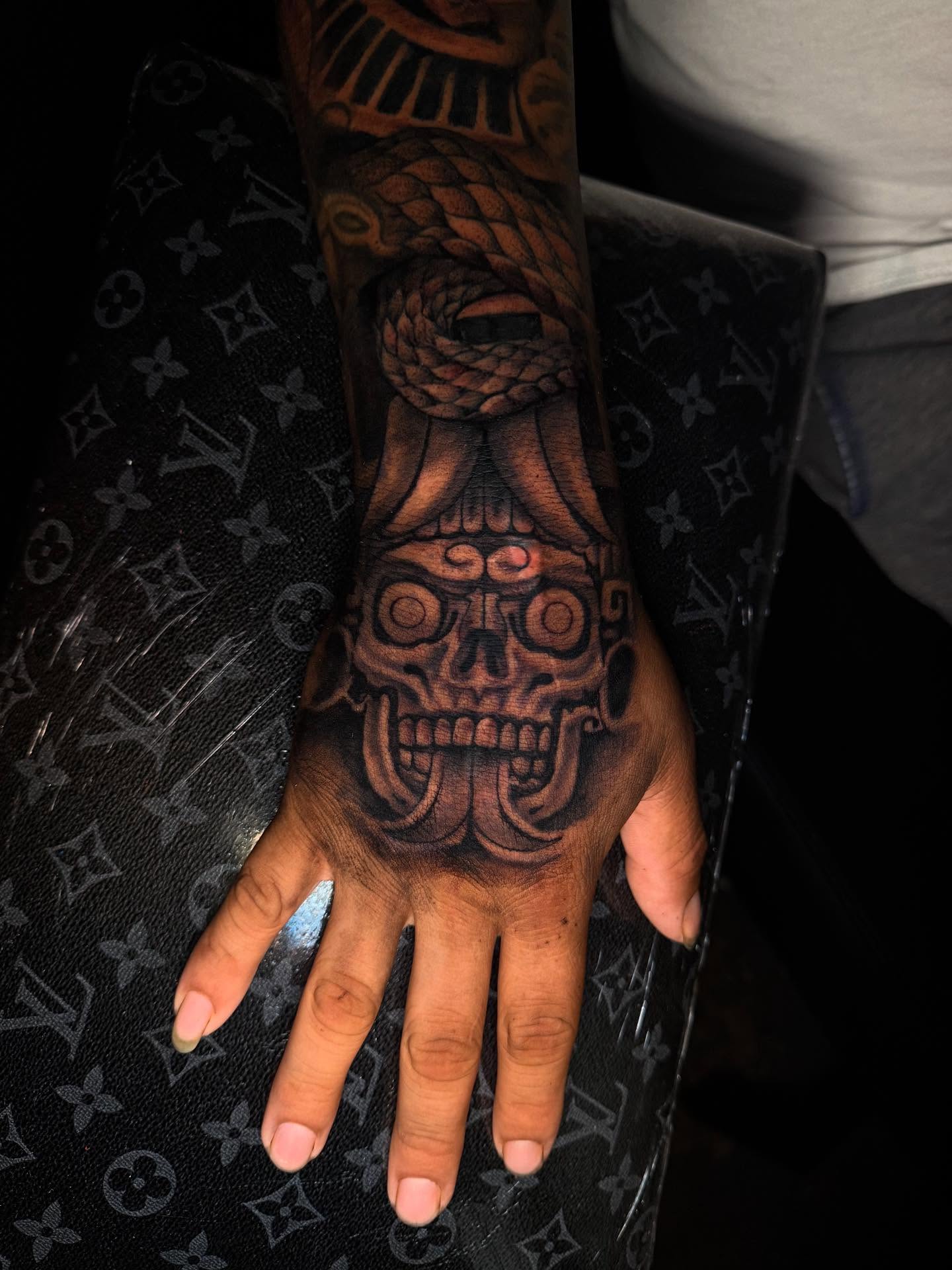 Skull realism tattoo on the hand by Smuk One