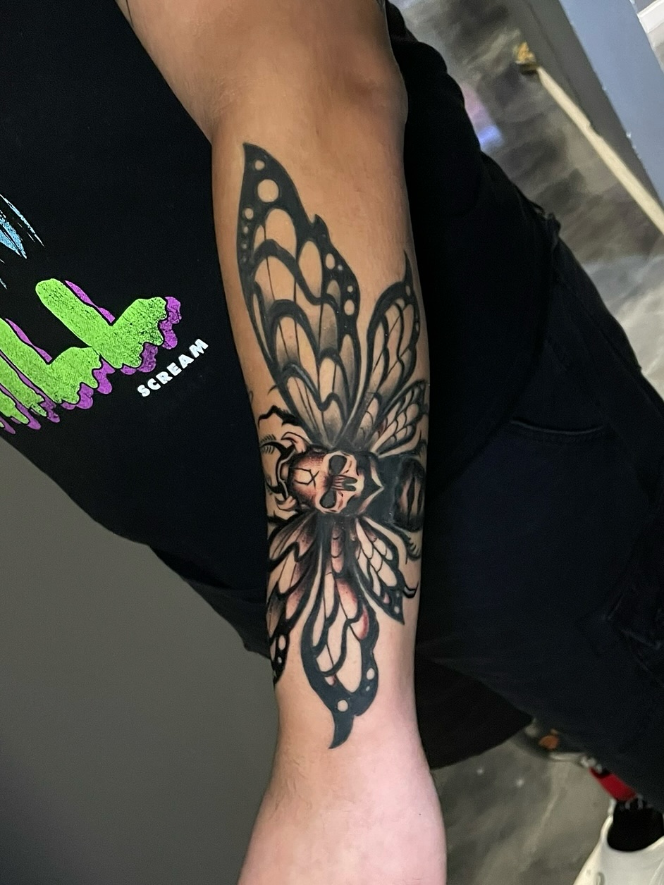Butterfly realism tattoo on the forearm by Chubbs