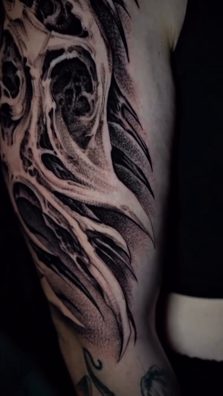 Abstract organic forms dark realism tattoo by Claire Litsey