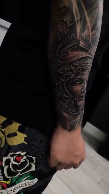 Tattoo by @ink_m4gic12 — realism, black_and_grey