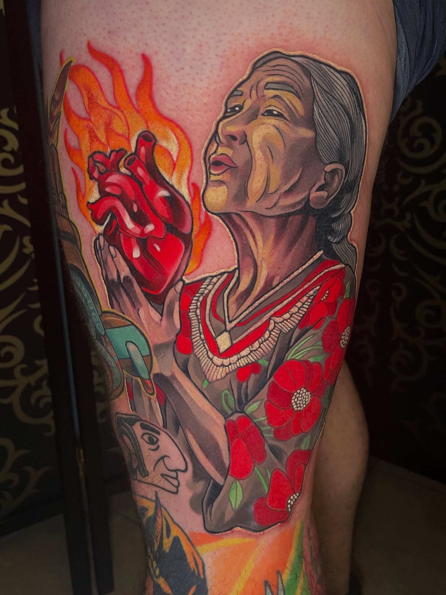 Woman with heart American traditional tattoo on the forearm by Willy Cutlip