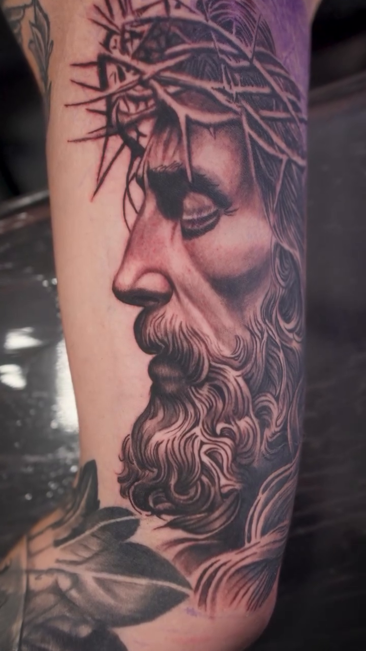 Tattoo by @obsidianinkstudio — realism, black_and_grey