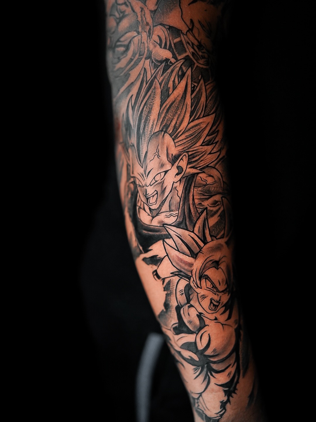 Dragon ball characters anime tattoo on the forearm by Joseph Marshall