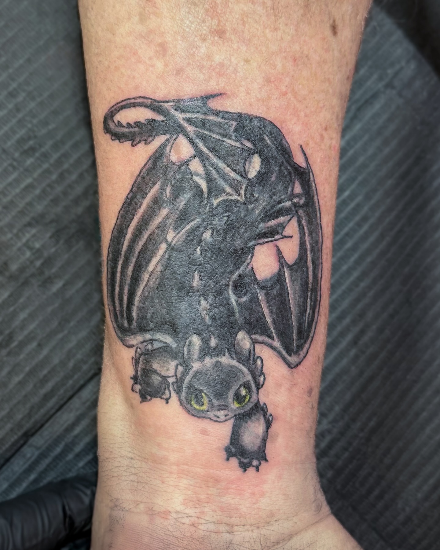 Night fury dragon black and grey tattoo on the forearm by π·πππ, Cleveland, Ohio
