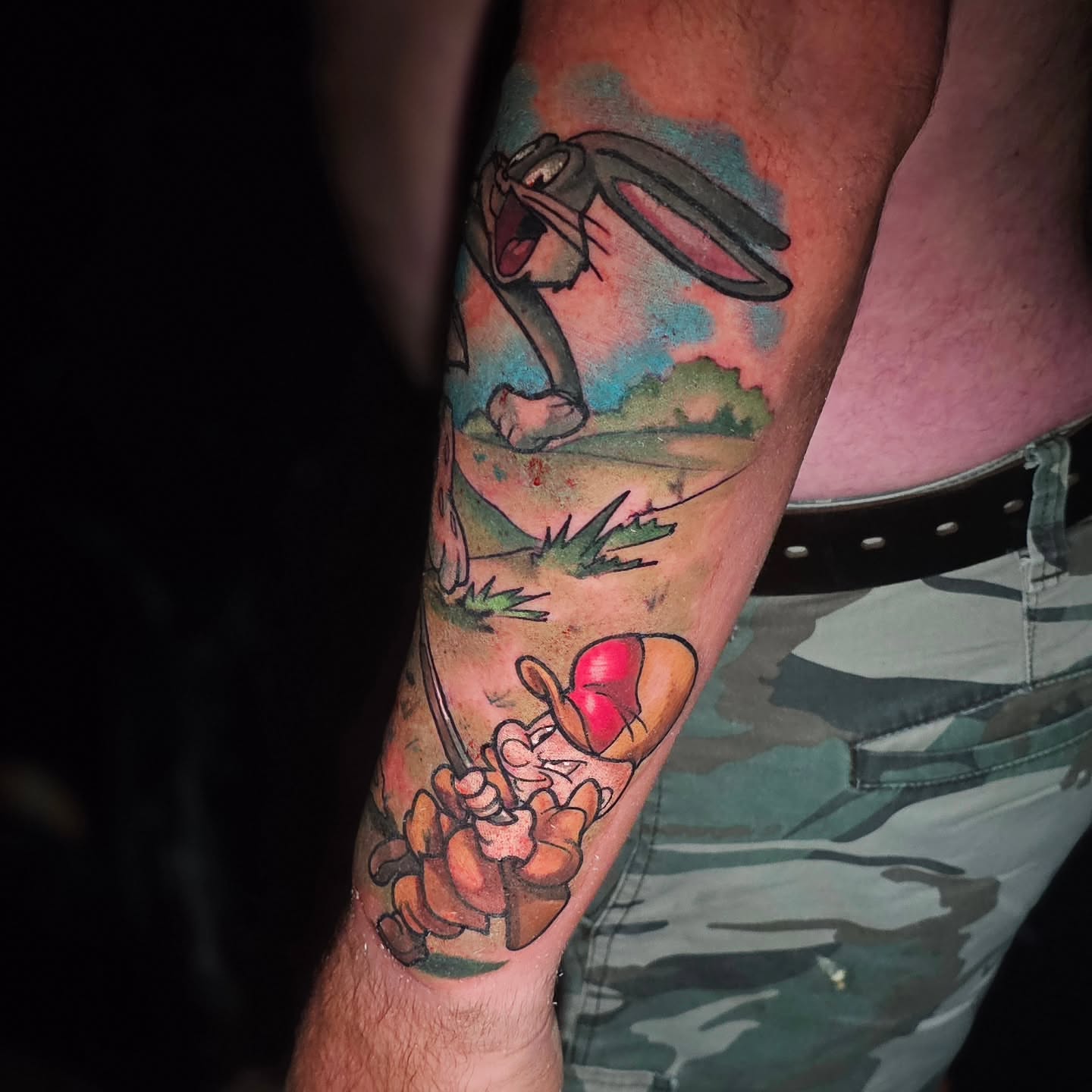 Looney tunes characters American traditional tattoo on the forearm by Cody Gower Tattoo Artist