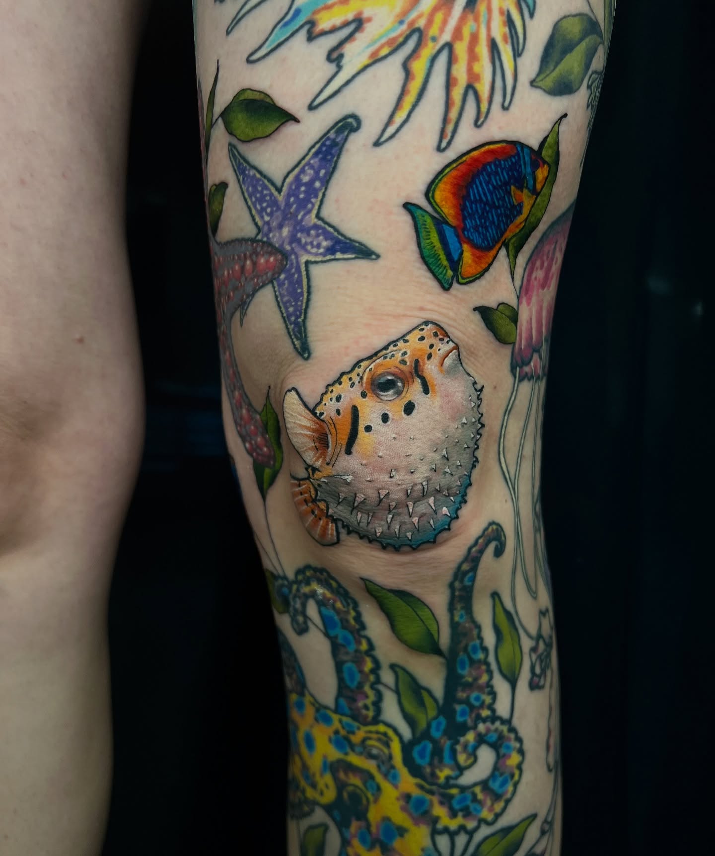 Underwater scene dotwork tattoo on the forearm by Pam Sanders