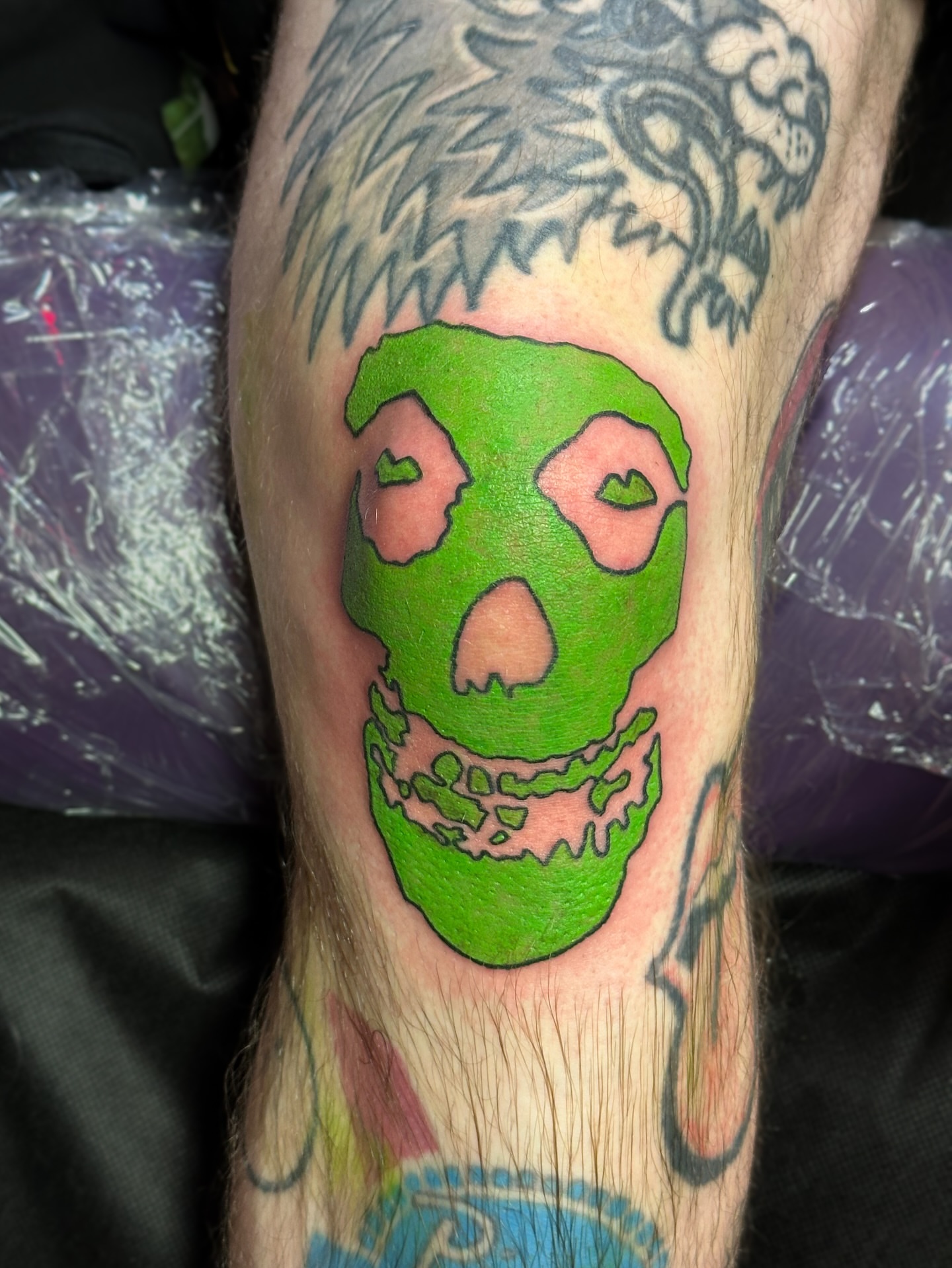 Skull with lips trash polka tattoo on the forearm by π·πππ, Cleveland, Ohio