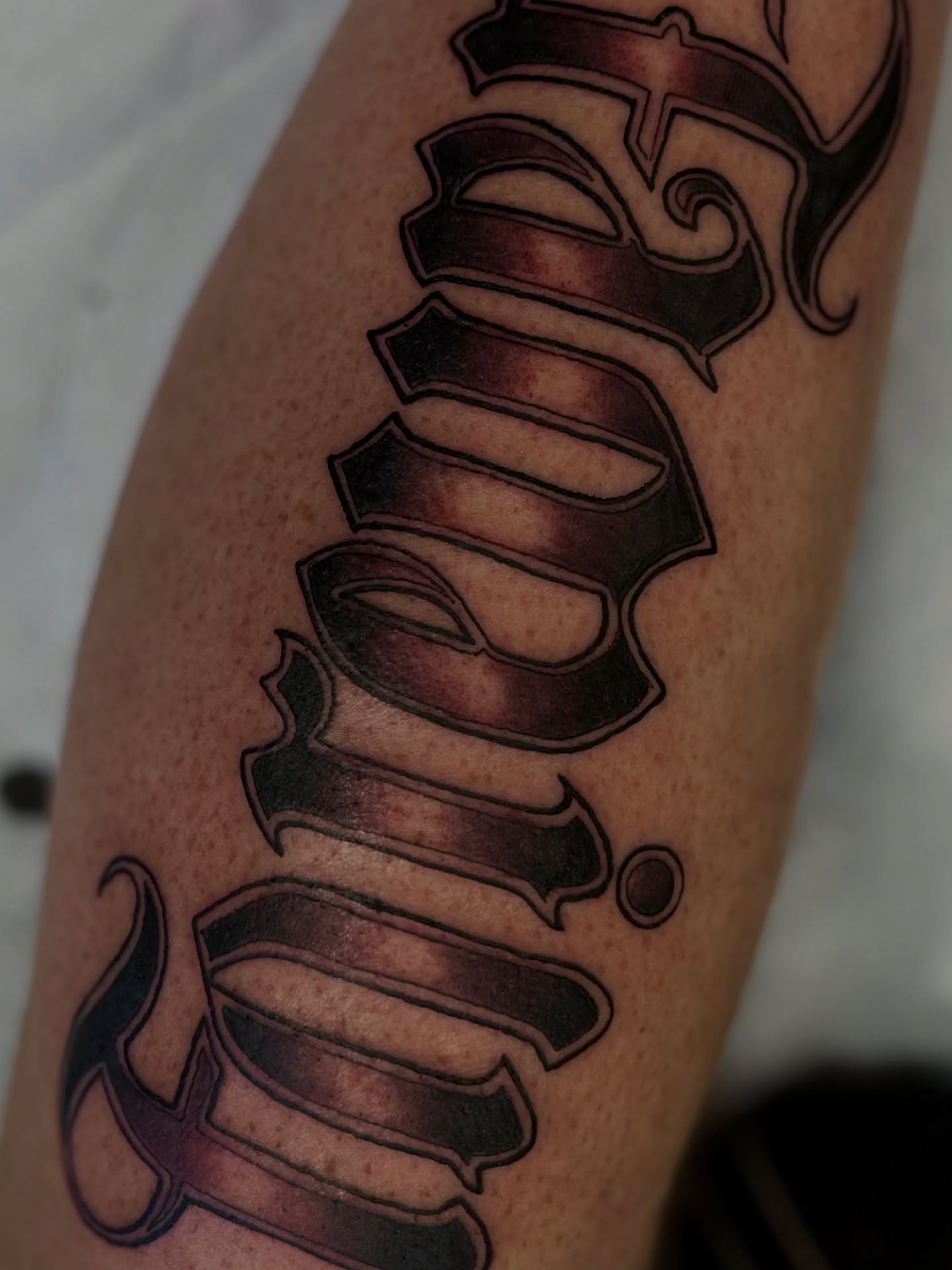 Tattoo by @madbowen.tattoos — lettering_script