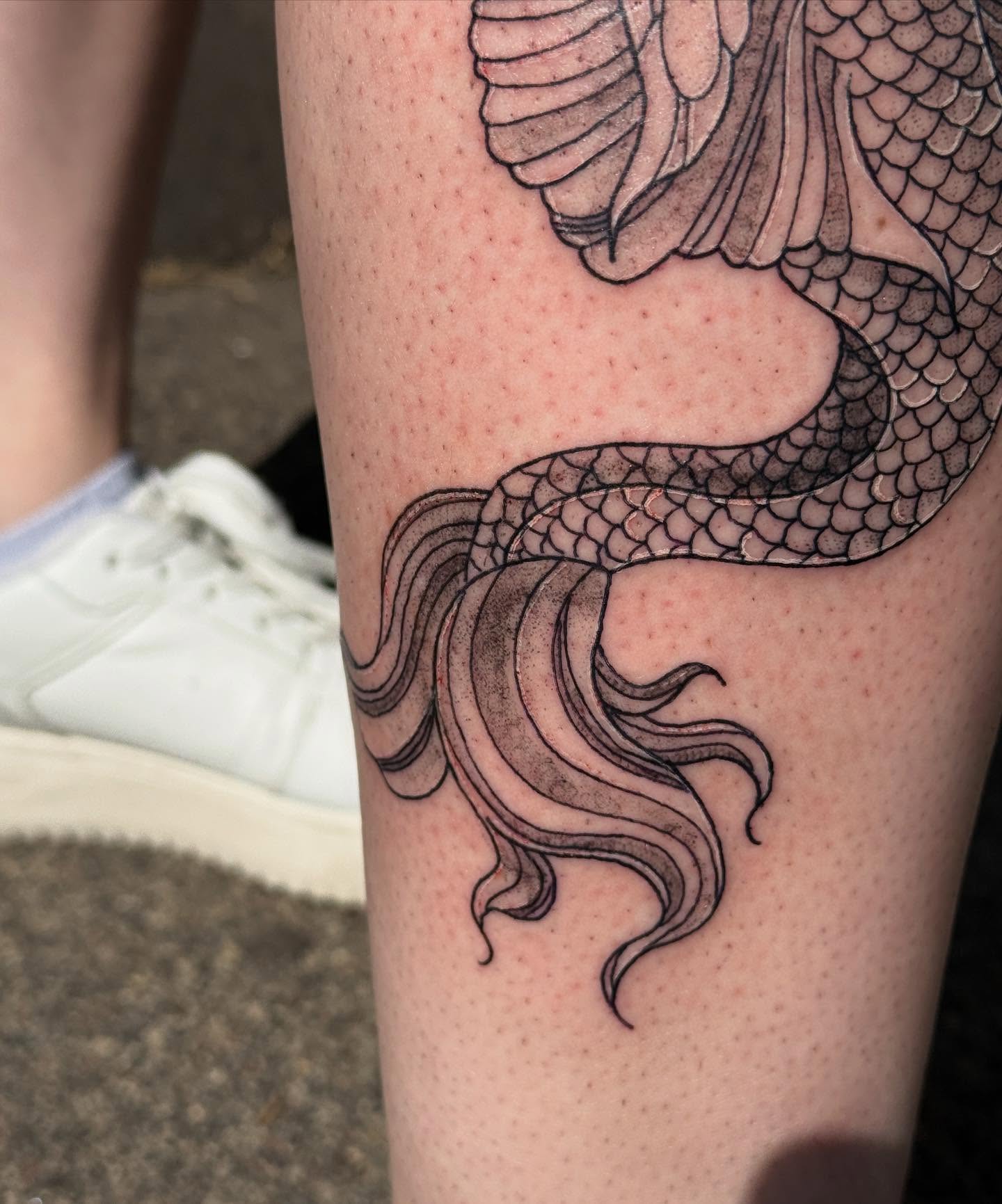 Serpent dotwork tattoo on the thigh by goose 🪿