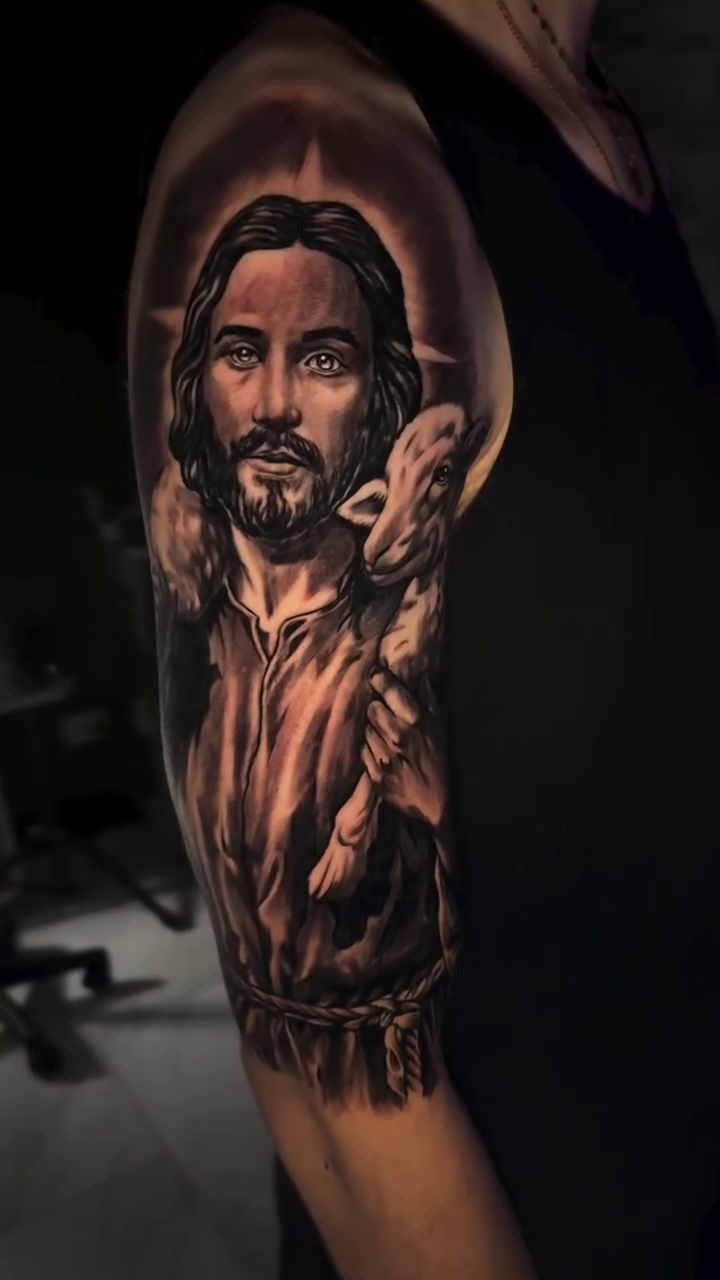 Jesus Christ with a lamb realism tattoo by Anthony Coleman, Midland, Texas