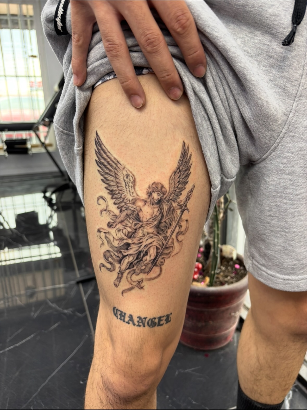 Angel with sword black and grey tattoo on the thigh by $weet little leslie 🩶🧚🏻‍♀️