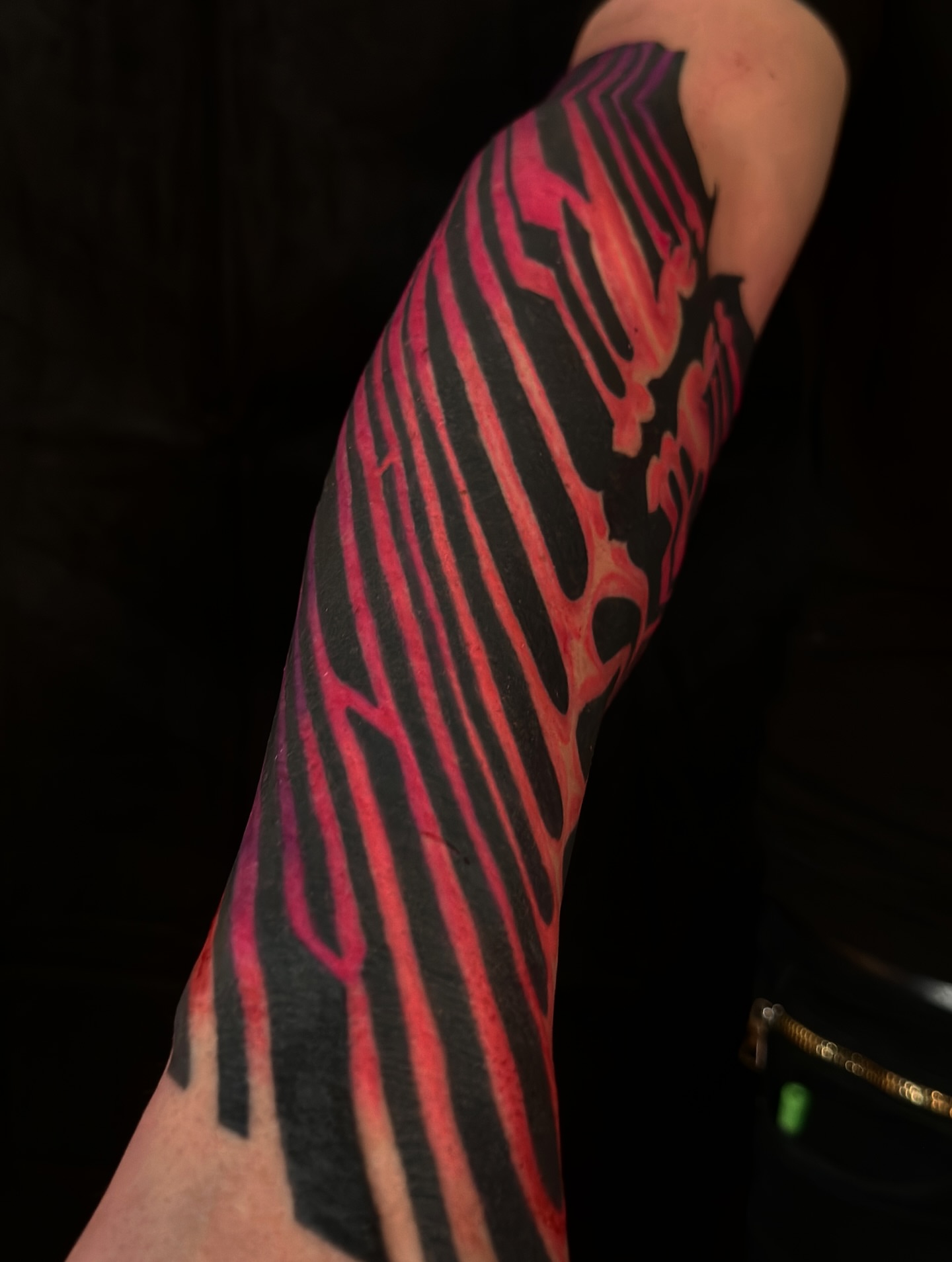 Zebra stripes geometric tattoo on the forearm by Jordan Rookus