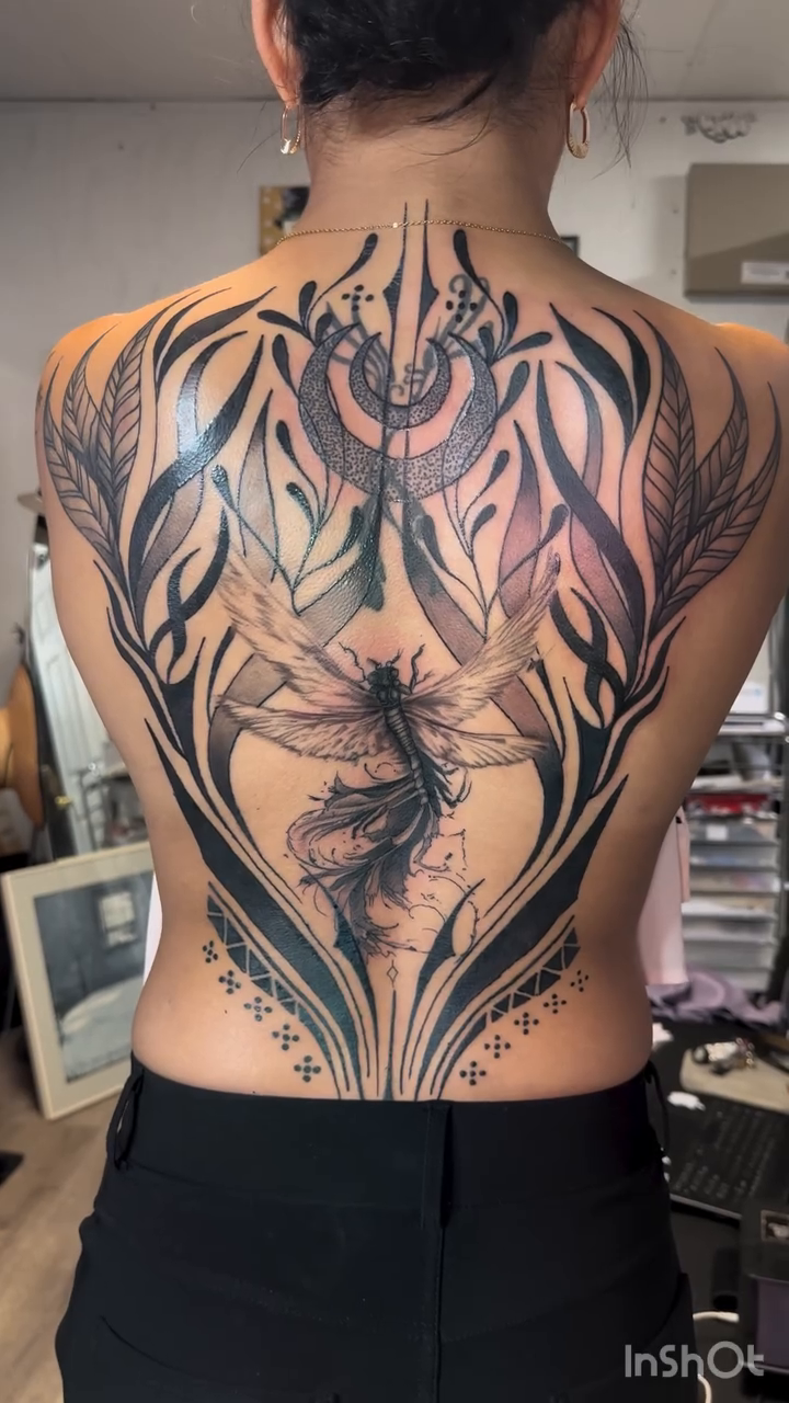 Dragonfly with floral and geometric elements ornamental tattoo by Juan c munoz jr, Chicago, Illinois