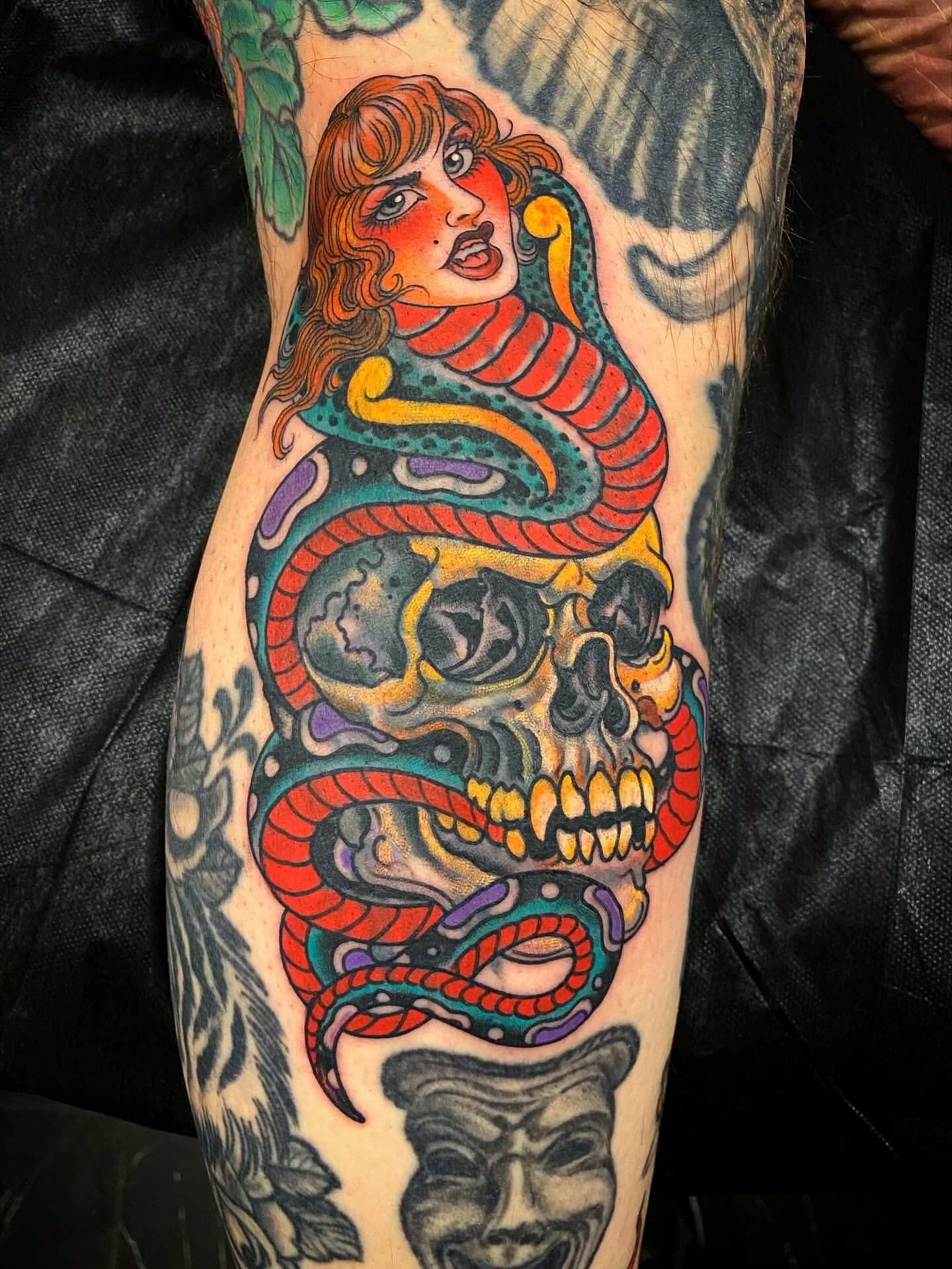 Snake and woman American traditional tattoo on the forearm by Adam Warmerdam, Los Angeles, California