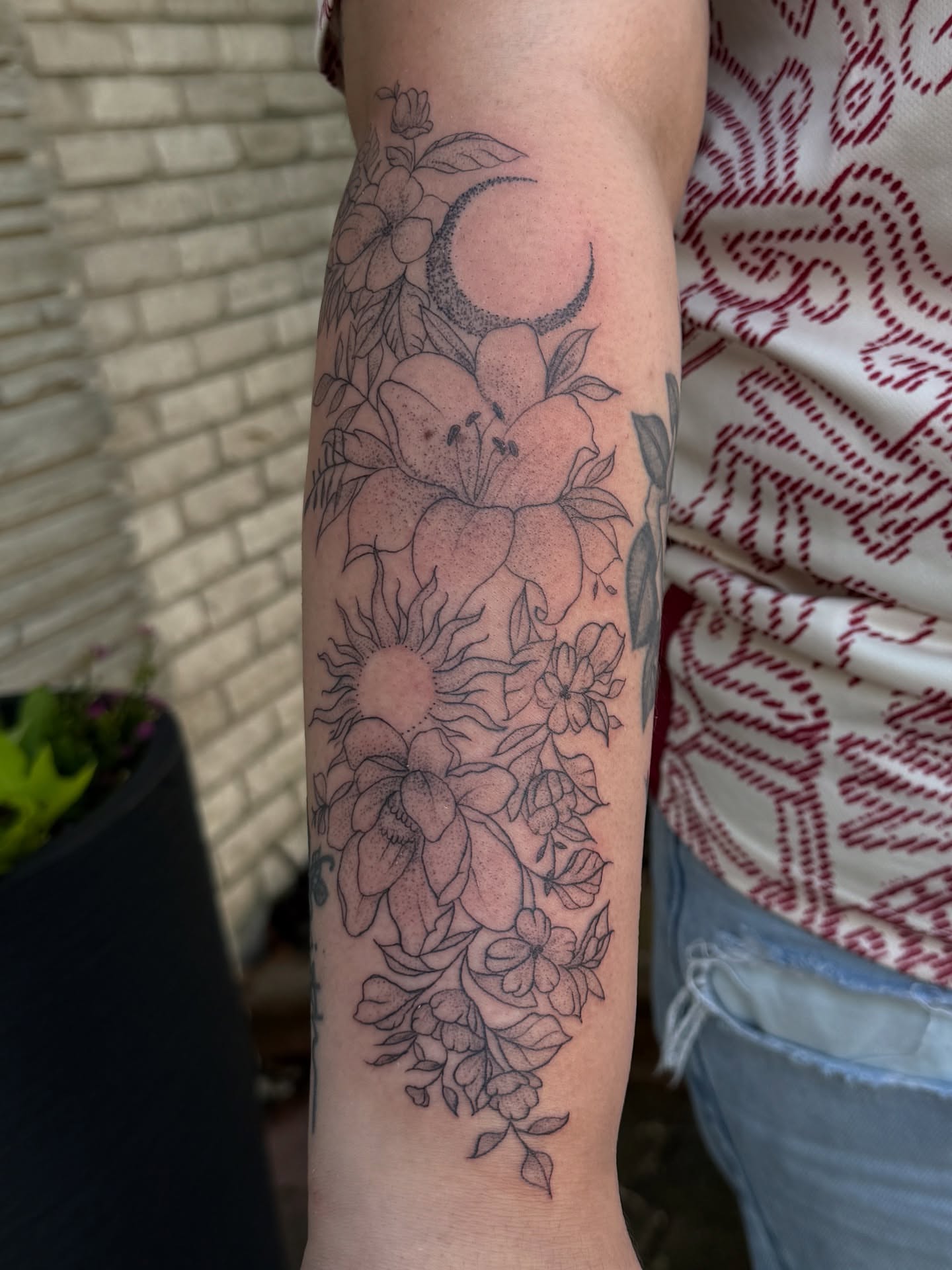 Flowers and crescent moon black and grey tattoo on the forearm by ollie b ⋆⟡⋆, Dayton, Ohio