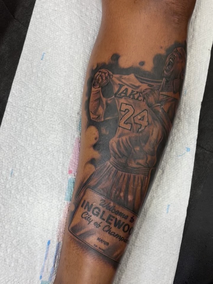 Basketball player realism tattoo on the forearm by michael